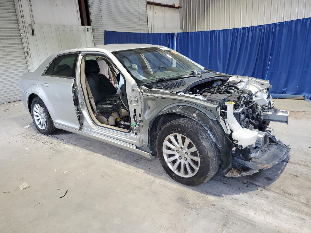 2012 Chrysler 300 Silver vin: 2C3CCAAG1CH289268 Damage: Hood, Missing, Replacement Required