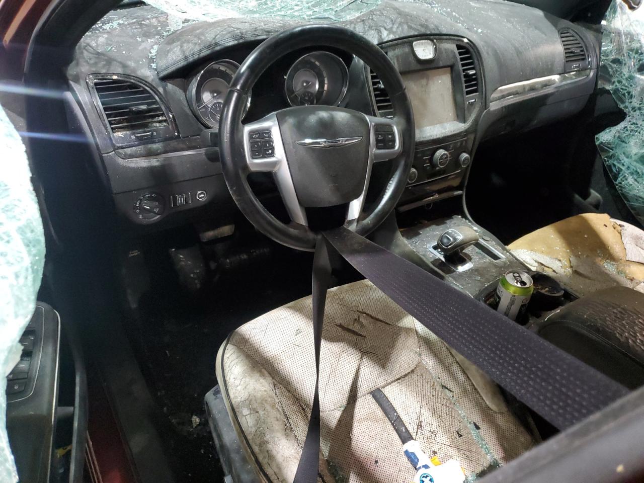 2013 Chrysler 300 Burgundy vin: 2C3CCAAGXDH698323 Damage: Right Front Seat, Torn, > 12 Inches