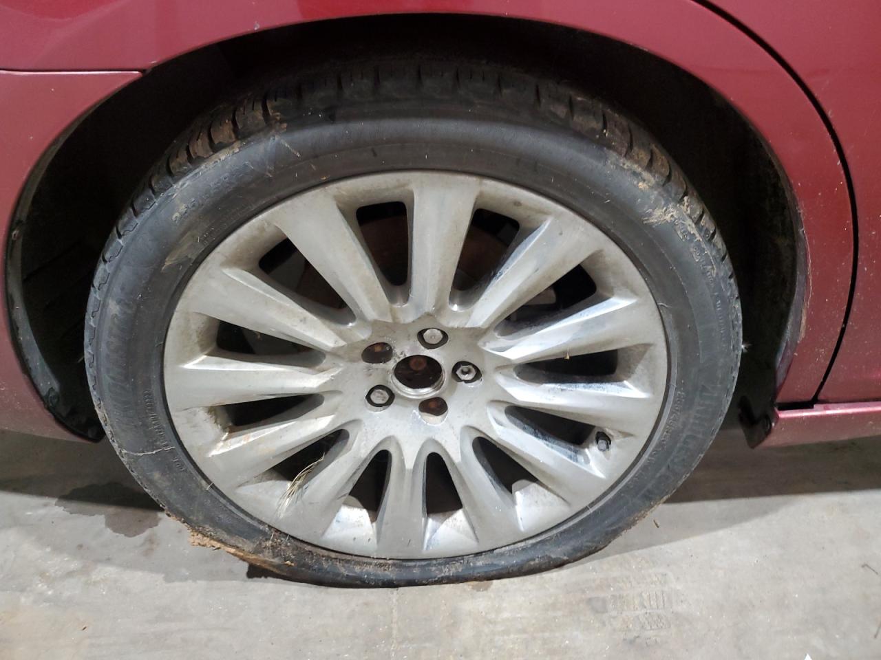 2013 Chrysler 300 Burgundy vin: 2C3CCAAGXDH698323 Damage: Right Rear Center Cap, Missing, Replacement Required