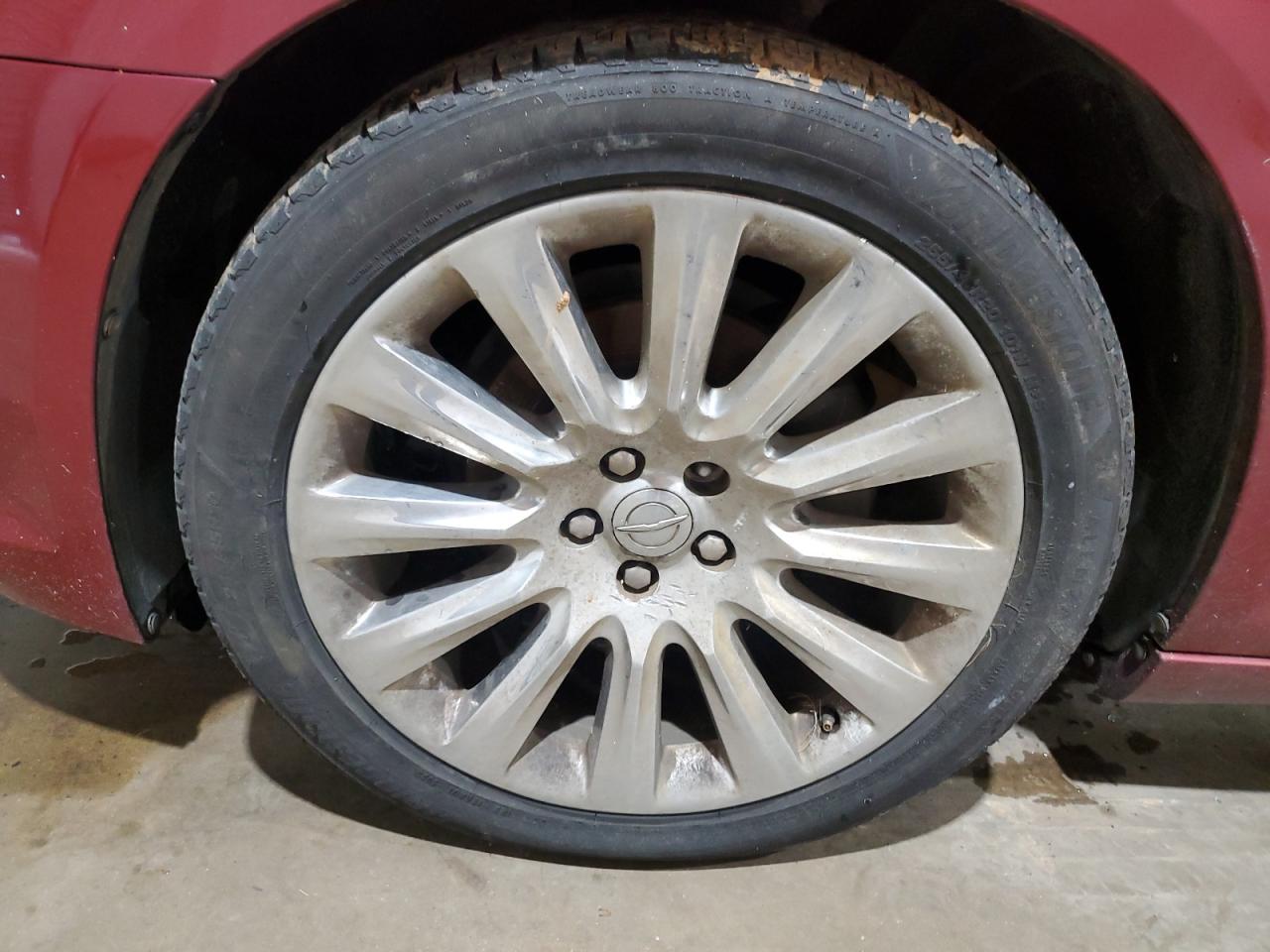2013 Chrysler 300 Burgundy vin: 2C3CCAAGXDH698323 Damage: Left Front Tire, Worn, Replacement Required