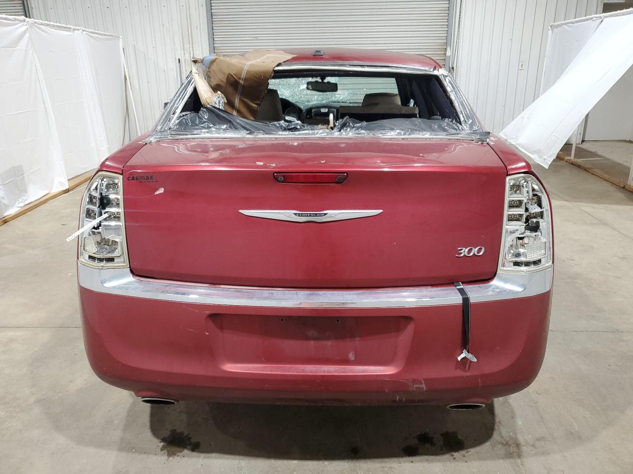 2013 Chrysler 300 Burgundy vin: 2C3CCAAGXDH698323 Damage: Rear Bumper/Cover, Scraped, 6 To 7 Inches