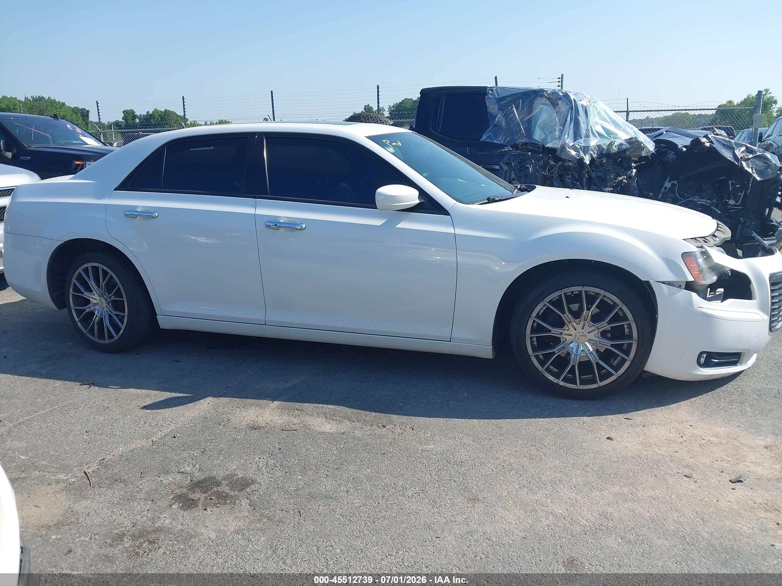 2014 Chrysler 300   White vin: 2C3CCABG3EH230983