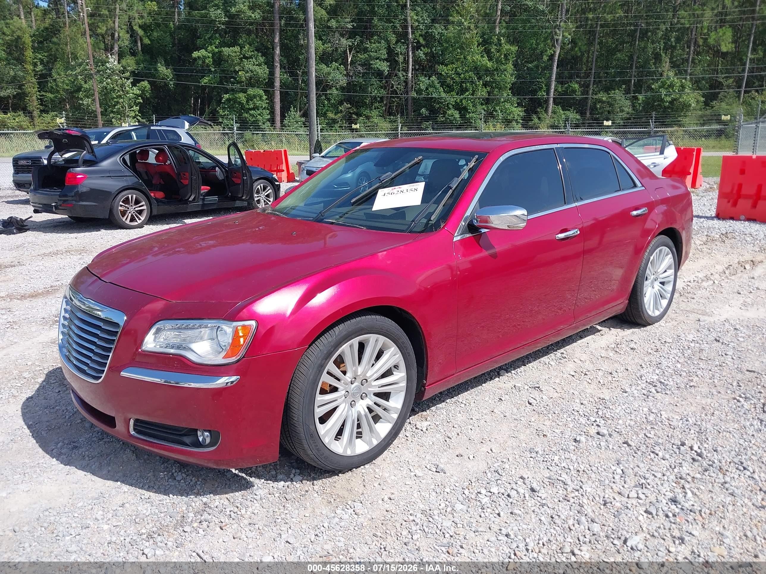 2012 Chrysler 300c   Red vin: 2C3CCAETXCH144334