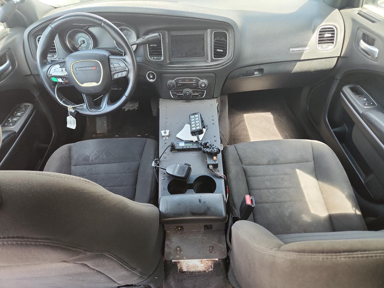 2019 Dodge Charger Police White vin: 2C3CDXAG7KH544570 Damage: Front Center Armrest, Aftermarket, Acceptable