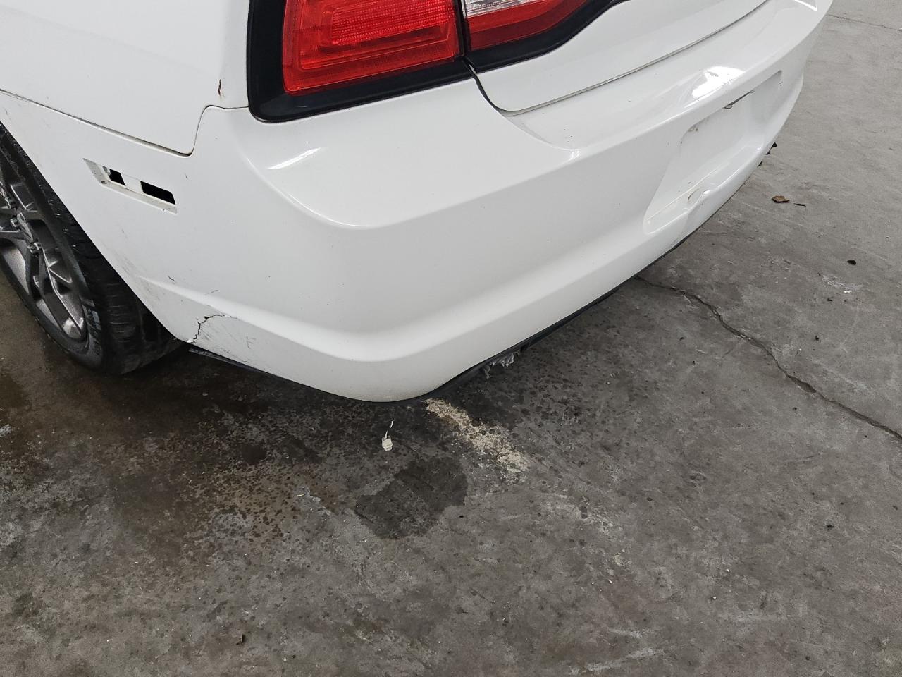2014 Dodge Charger Police White vin: 2C3CDXAT5EH206781 Damage: Rear Bumper, Broken, Replacement Required