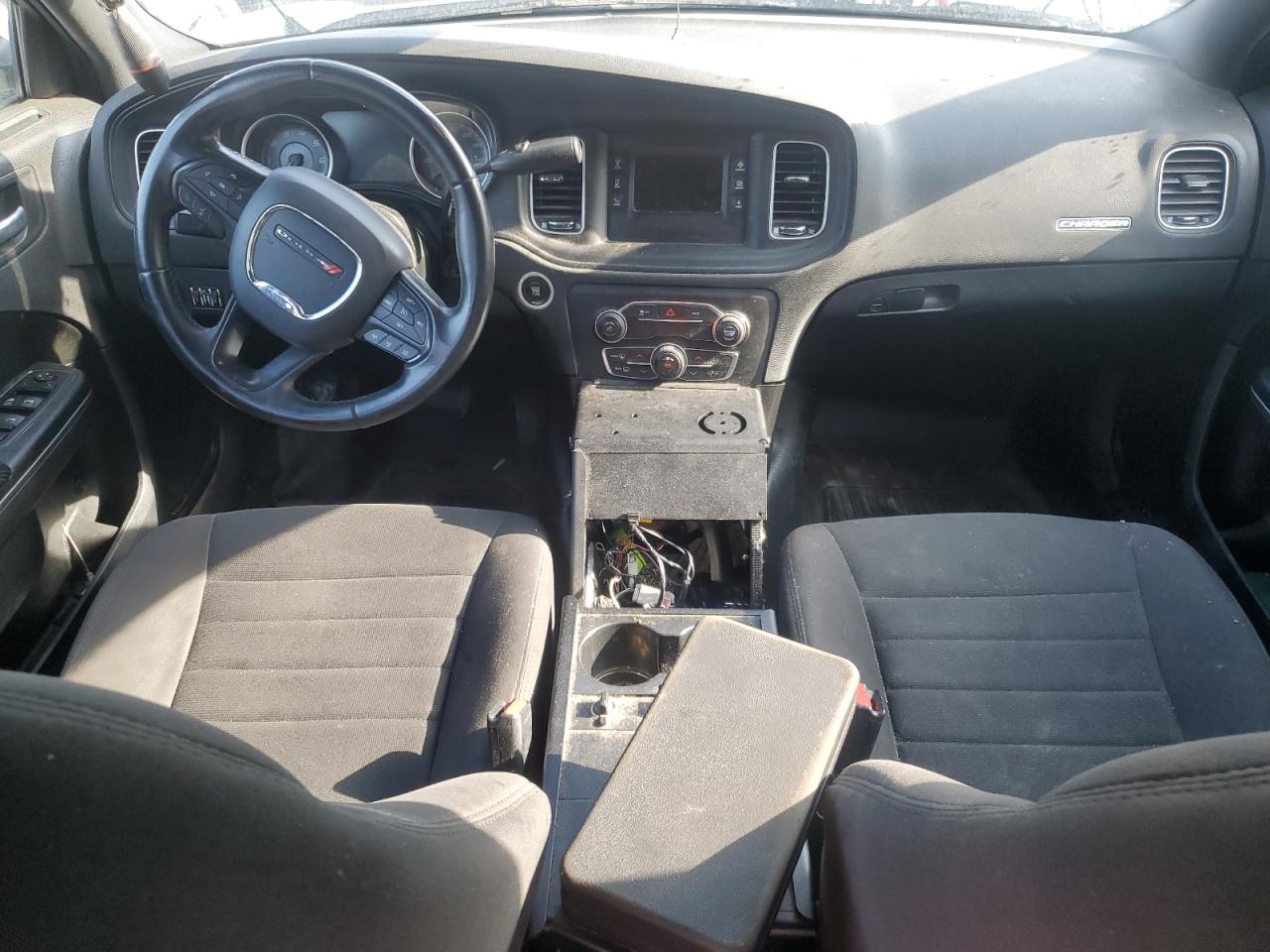 2015 Dodge Charger Police White vin: 2C3CDXAT5FH902042 Damage: Center Console, Aftermarket, Acceptable