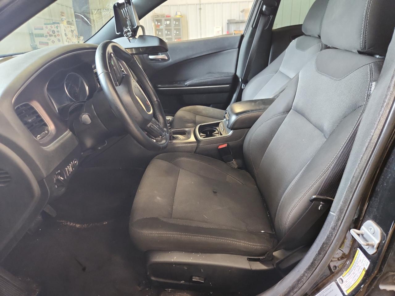 2017 Dodge Charger Se Black vin: 2C3CDXBG5HH627941 Damage: Left Front Seat Cushion, Burn Hole, 1/8 To 1/2 Inch