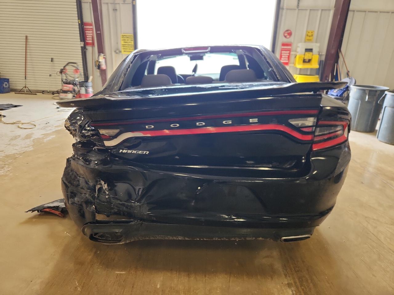 2017 Dodge Charger Se Black vin: 2C3CDXBG5HH627941 Damage: Rear Bumper Center Molding, Broken, Replacement Required