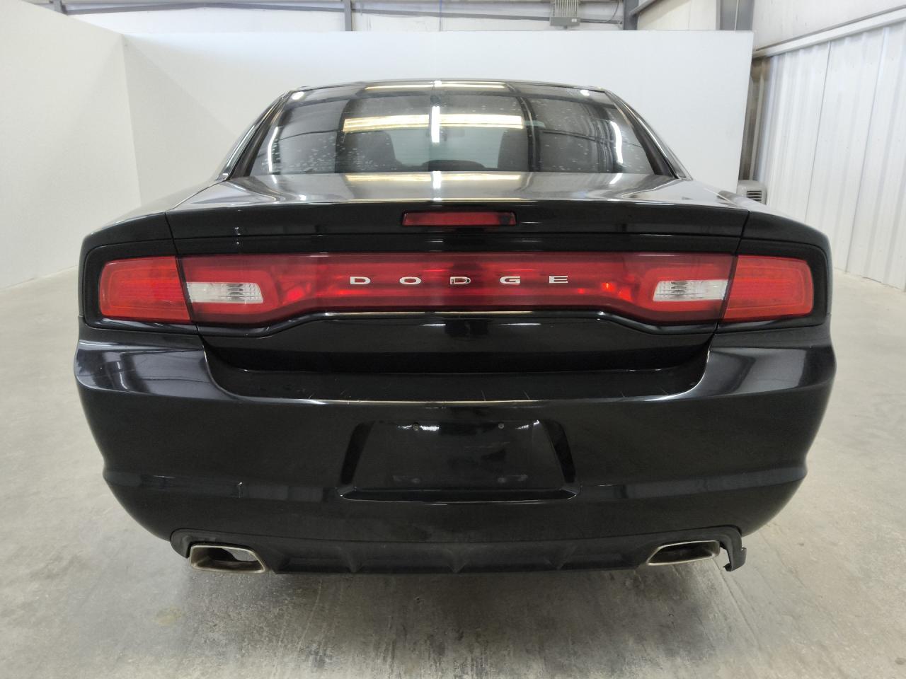 2013 Dodge Charger Se Black vin: 2C3CDXBG8DH684631 Damage: Rear Bumper Center Molding, Broken, Replacement Required