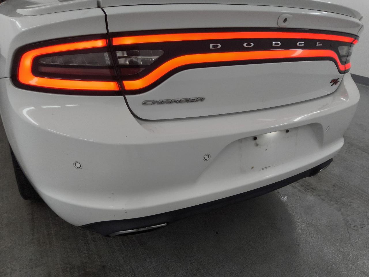 2015 Dodge Charger R/t White vin: 2C3CDXCTXFH741541 Damage: Rear Bumper, Dent(S) W/ Paint Dmg, 3 To 4 Inches
