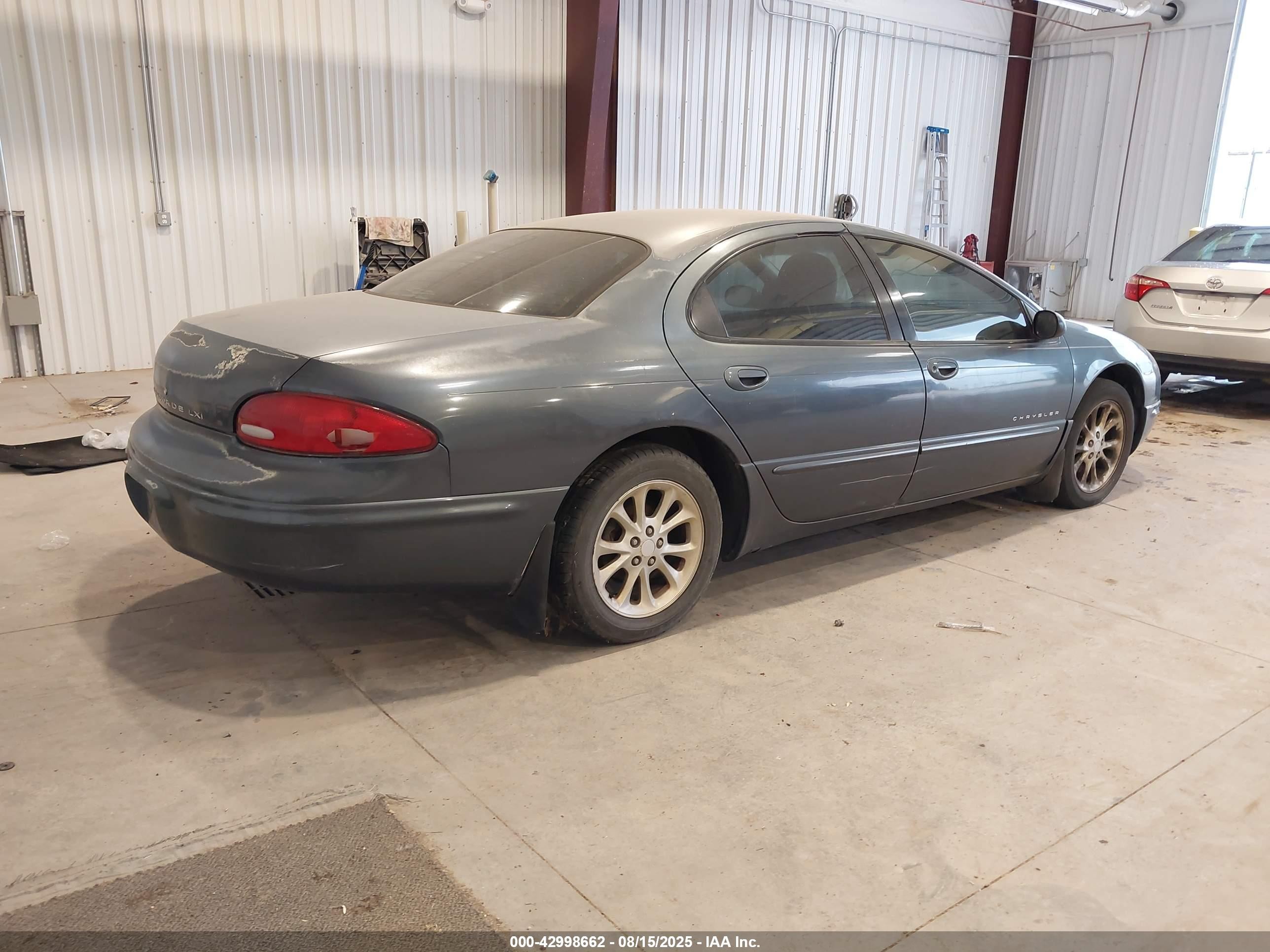 2000 Chrysler Lhs   Dark Blue vin: 2C3HC56G2YH260620