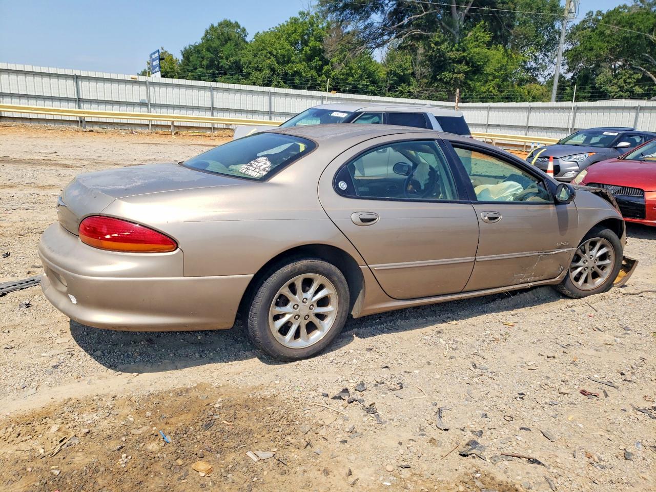 1999 Chrysler Lhs Tan vin: 2C3HC56G7XH573371