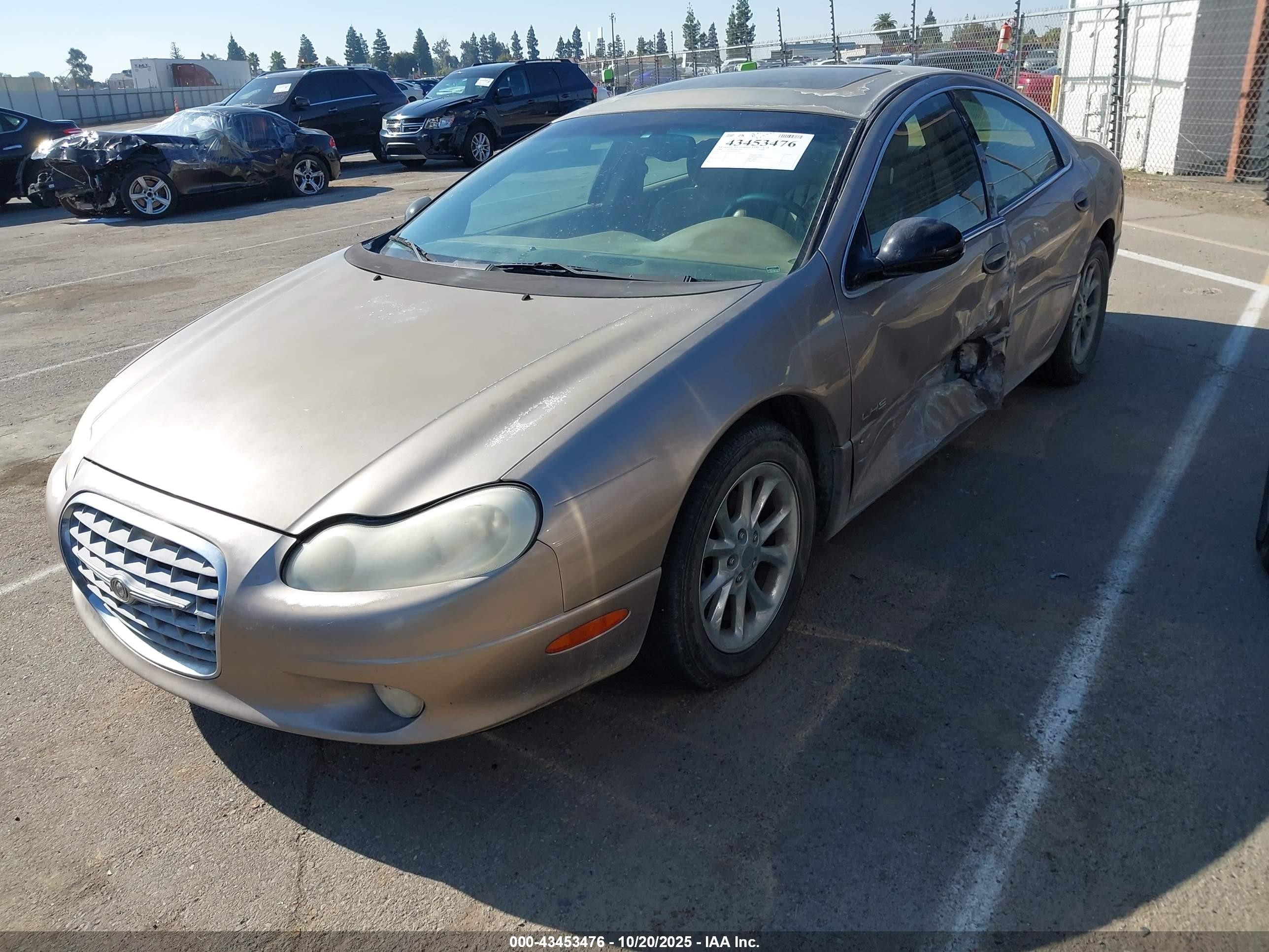2000 Chrysler Lhs   Brown vin: 2C3HC56G8YH405109