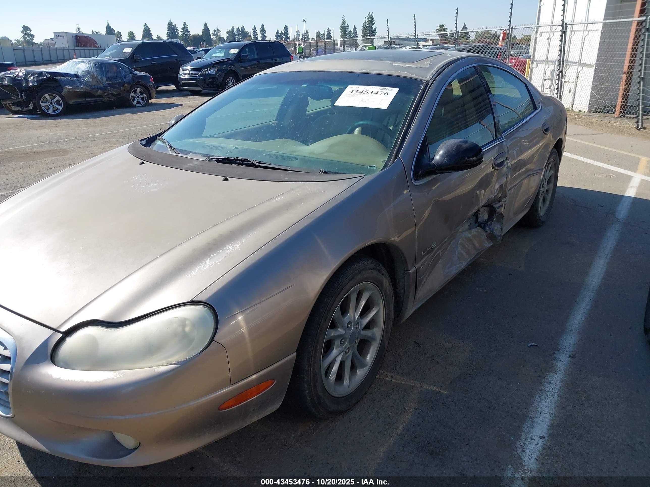 2000 Chrysler Lhs   Brown vin: 2C3HC56G8YH405109
