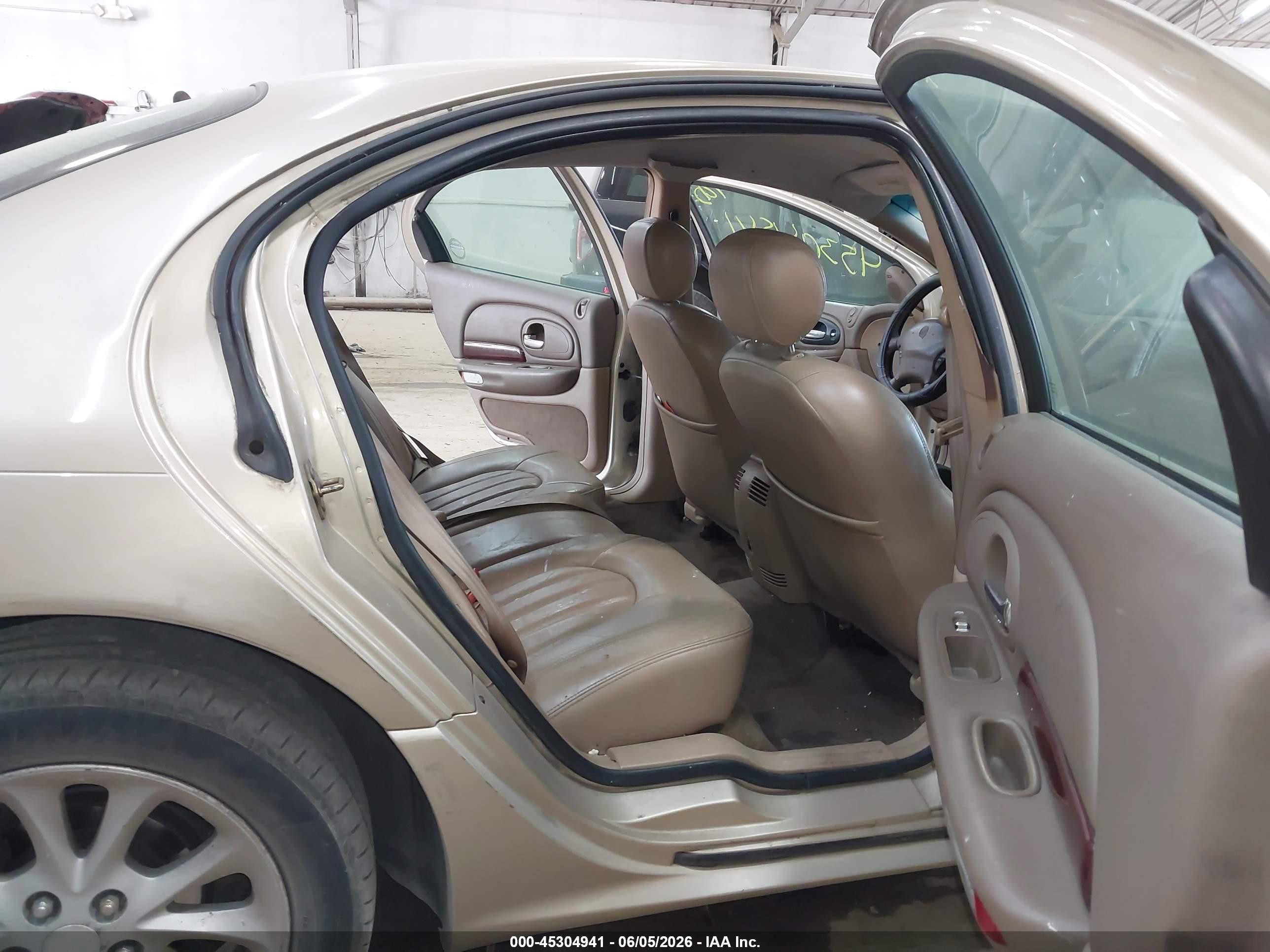 2000 Chrysler Lhs   Gold vin: 2C3HC56GXYH423935