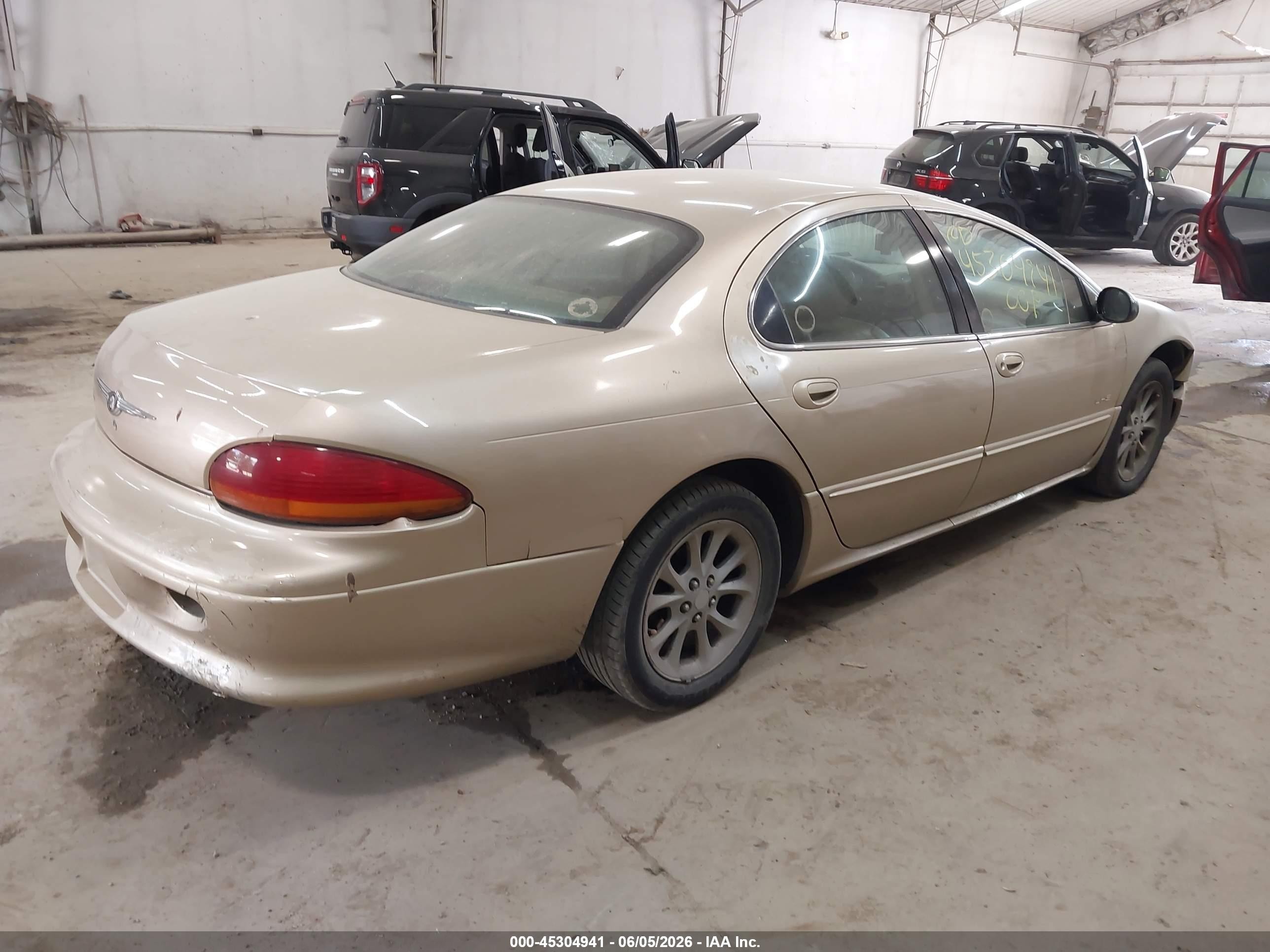 2000 Chrysler Lhs   Gold vin: 2C3HC56GXYH423935