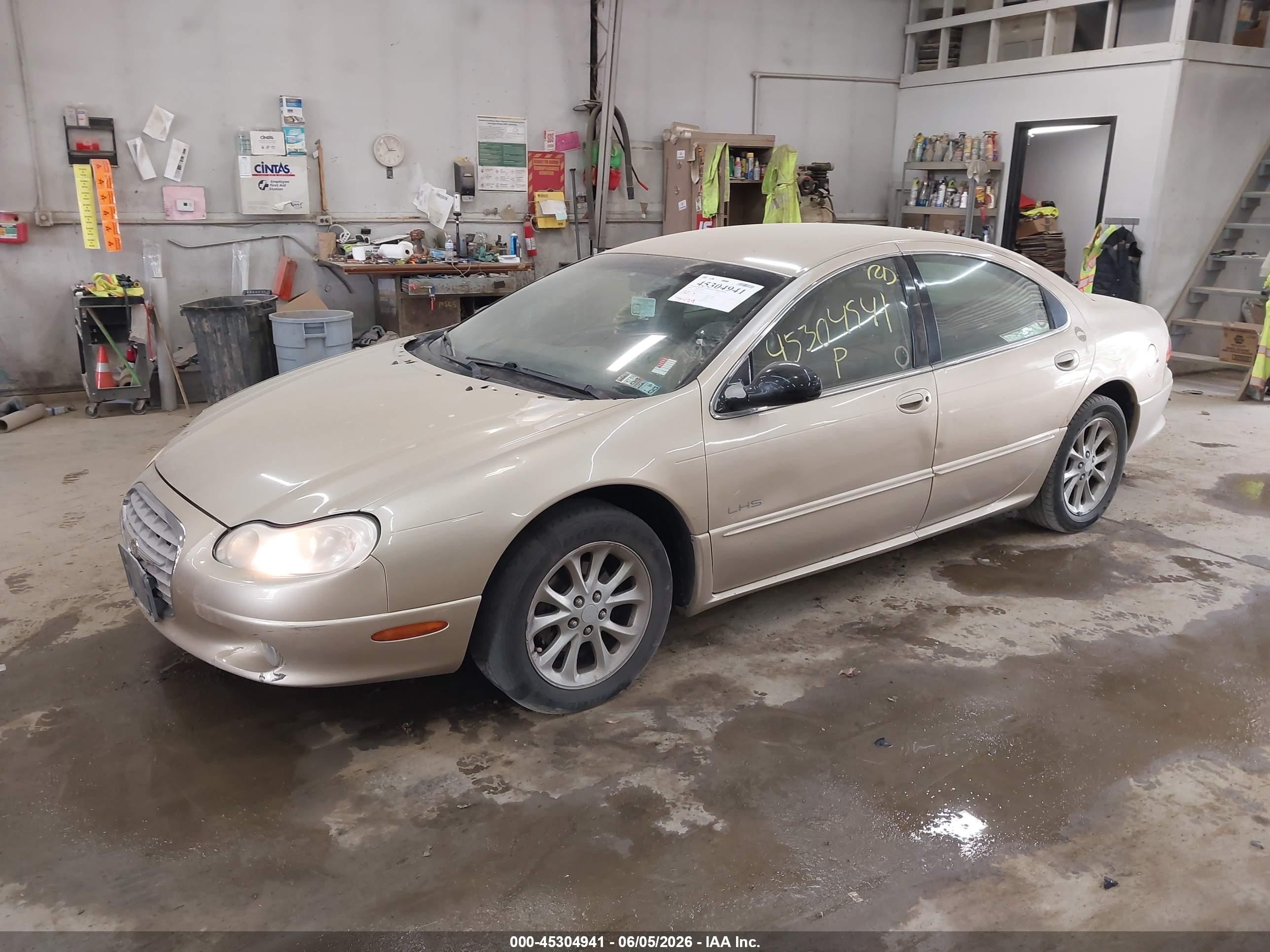 2000 Chrysler Lhs   Gold vin: 2C3HC56GXYH423935