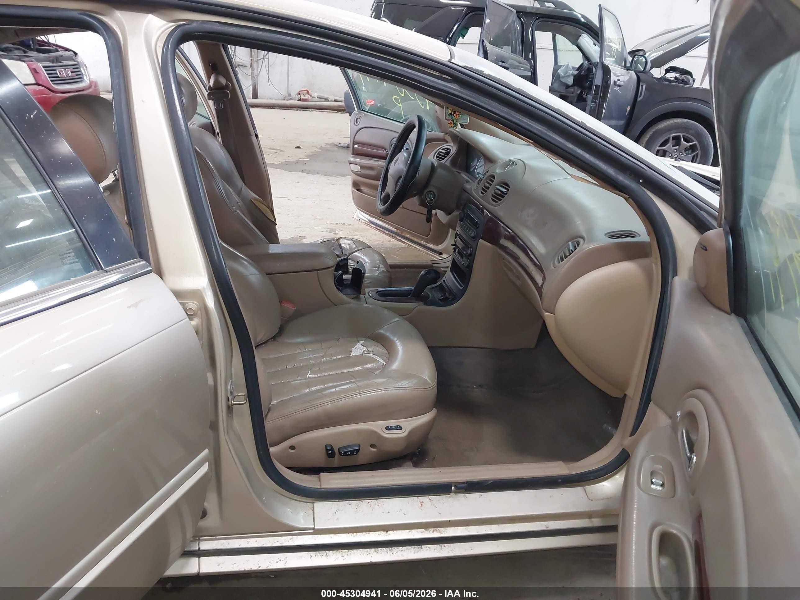 2000 Chrysler Lhs   Gold vin: 2C3HC56GXYH423935