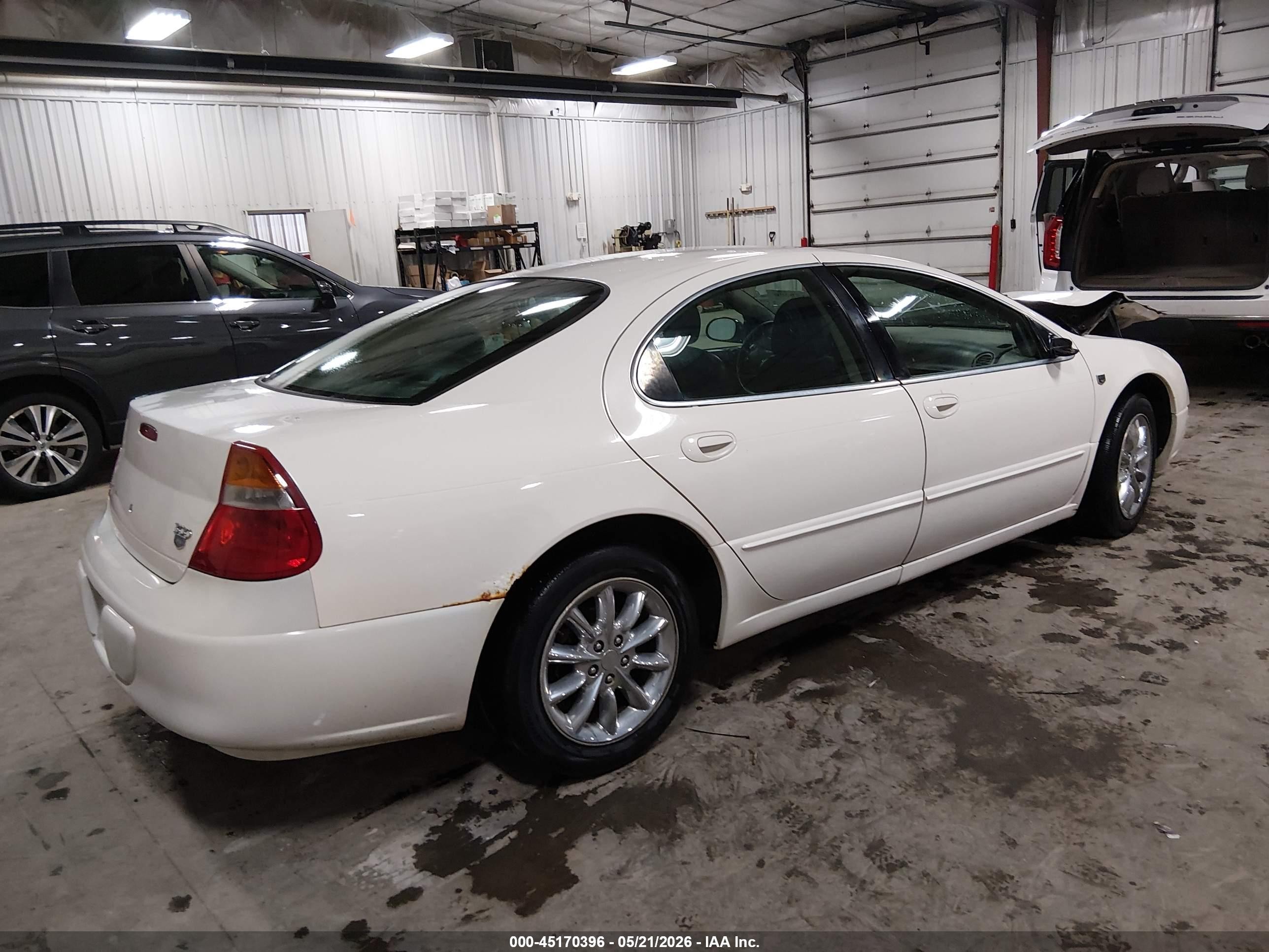 2004 Chrysler 300m   White vin: 2C3HE66G24H657481
