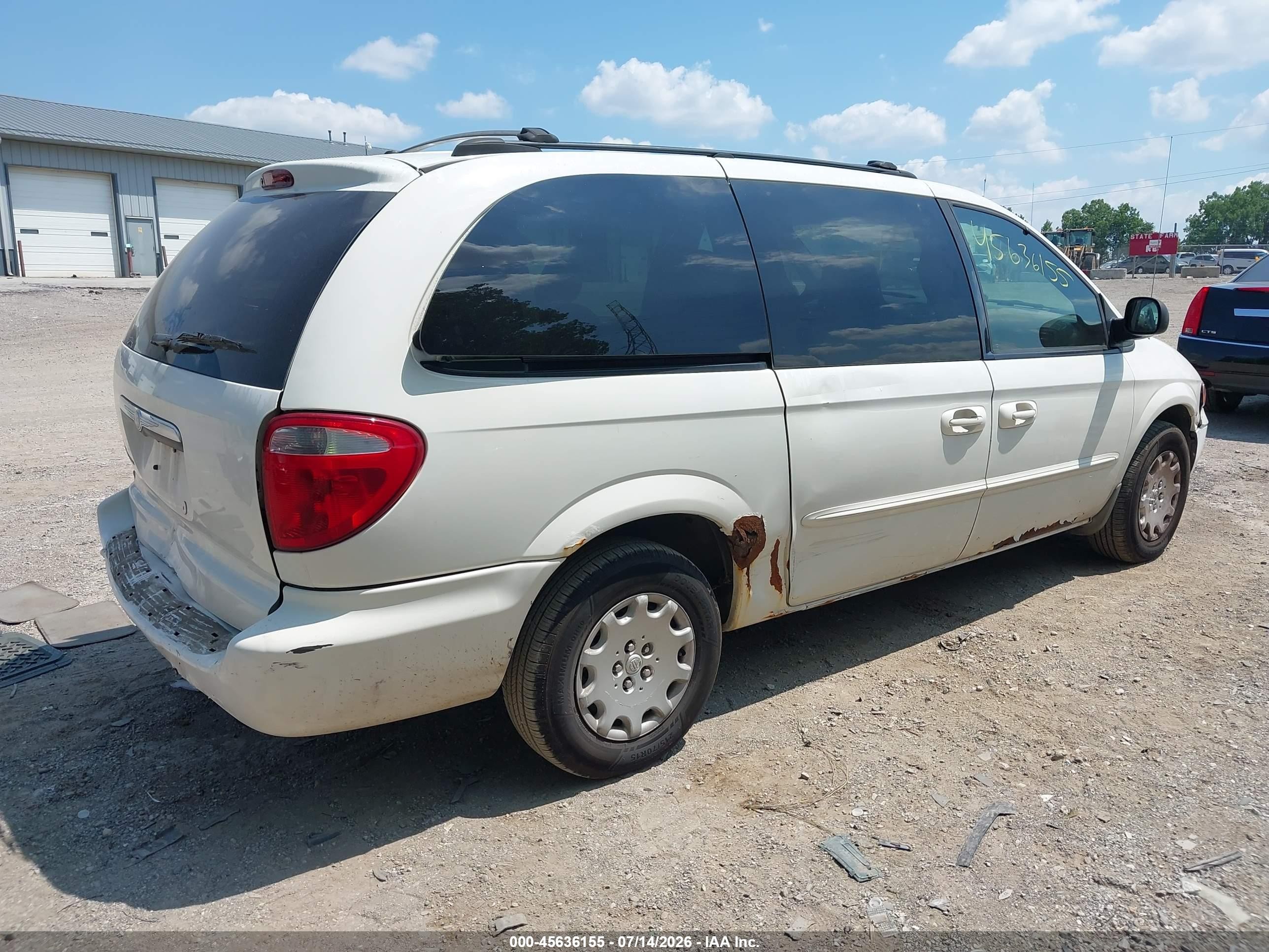 2003 Chrysler Town & Country   White vin: 2C4GP24303R243277
