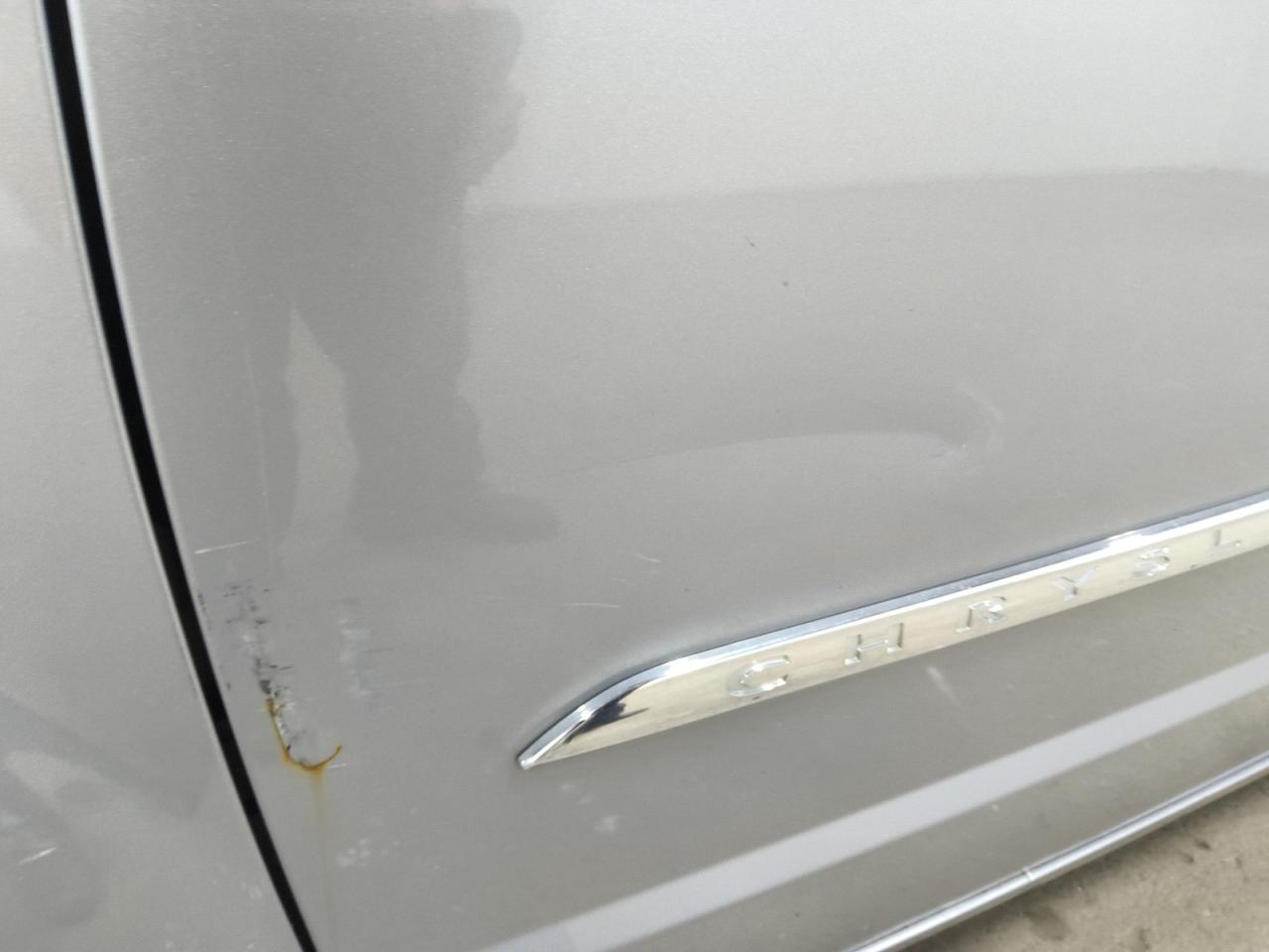 2014 Chrysler Town & Country Touring Silver vin: 2C4RC1BGXER111019 Damage: Left Front Fender, Dent(S) W/ Paint Dmg, > 12 Inches