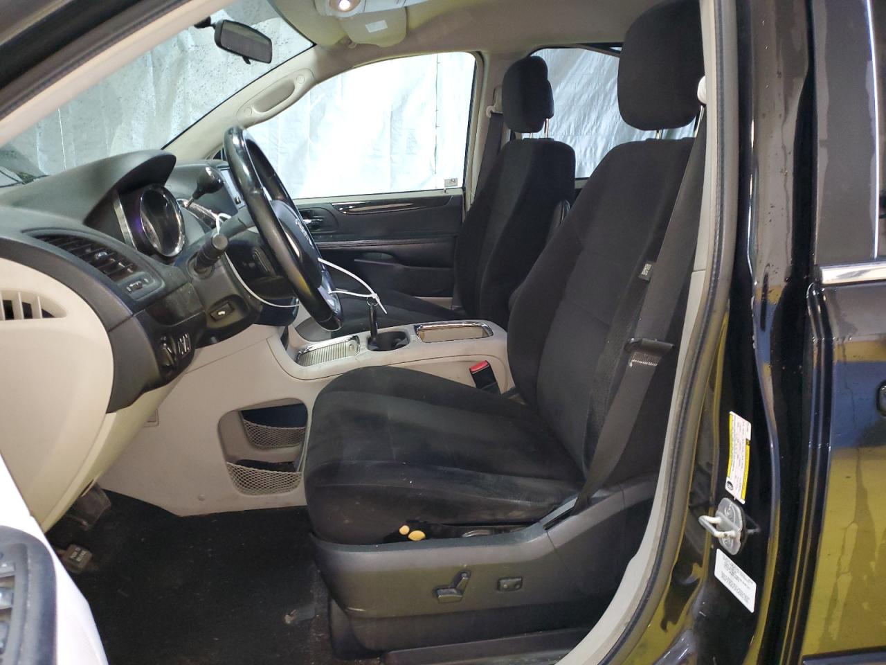 2012 Dodge Grand Caravan Crew Black vin: 2C4RDGDG0CR351402 Damage: Left Front Seat, Stained, Permanent