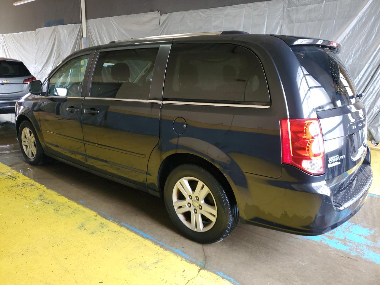 2012 Dodge Grand Caravan Crew Black vin: 2C4RDGDG0CR351402 Damage: Left Qtr Panel, Dent(S) W/ Paint Dmg, 1/2 To 1 Inch