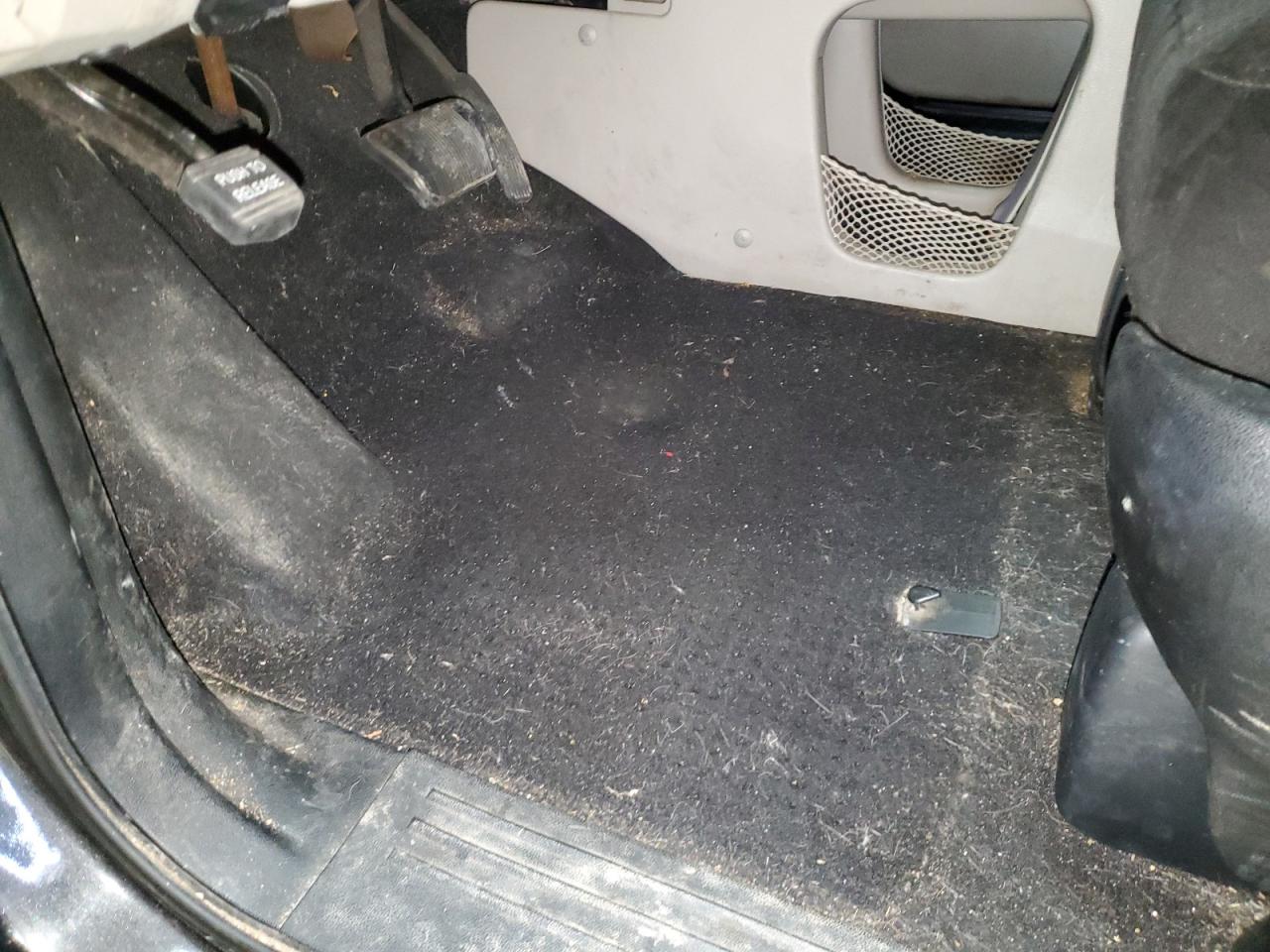 2012 Dodge Grand Caravan Crew Black vin: 2C4RDGDG0CR351402 Damage: Left Front Carpet, Stained, Permanent