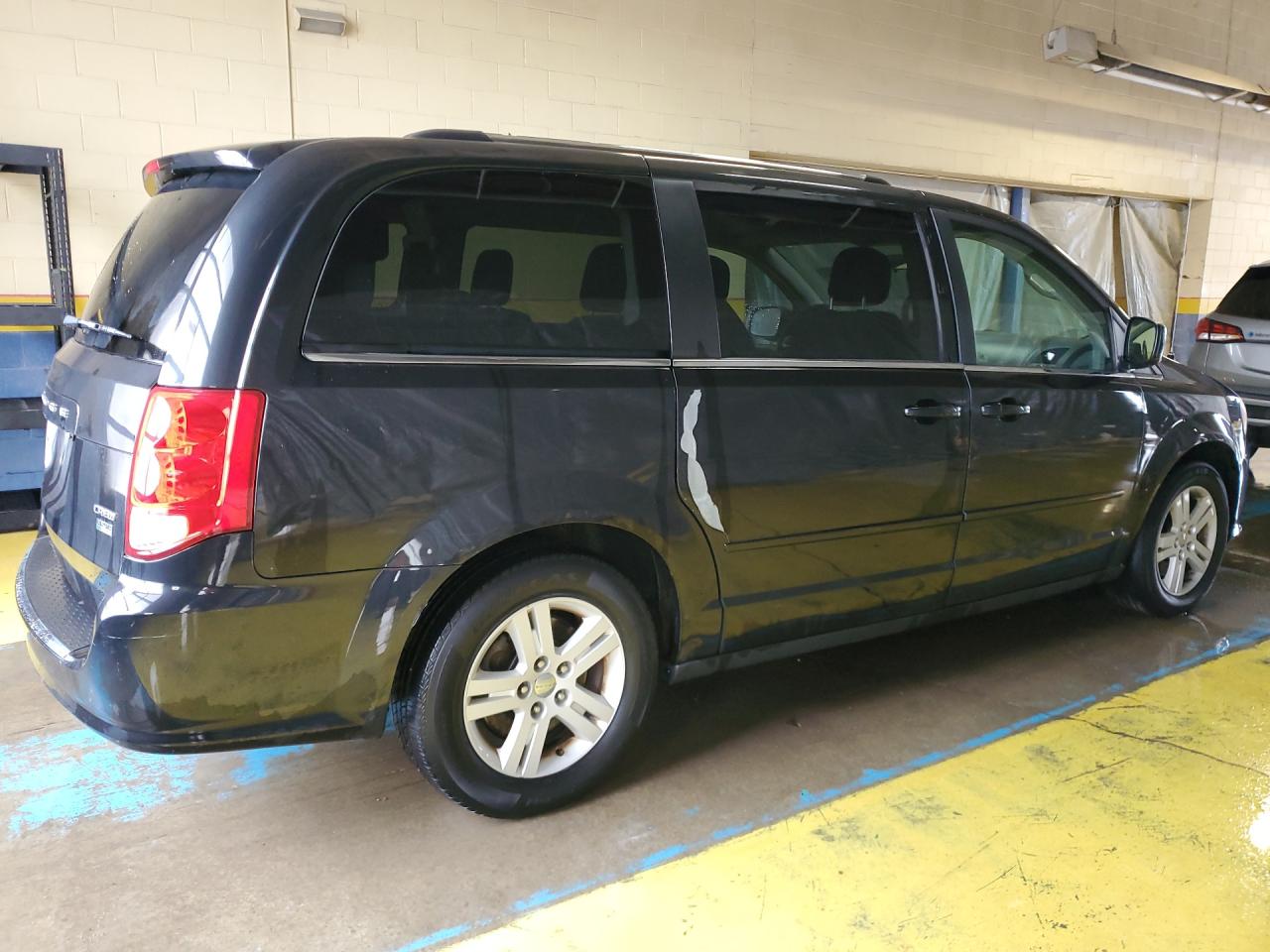 2012 Dodge Grand Caravan Crew Black vin: 2C4RDGDG0CR351402 Damage: Right Qtr Panel, Dent(S) W/ Paint Dmg, 1/2 To 1 Inch