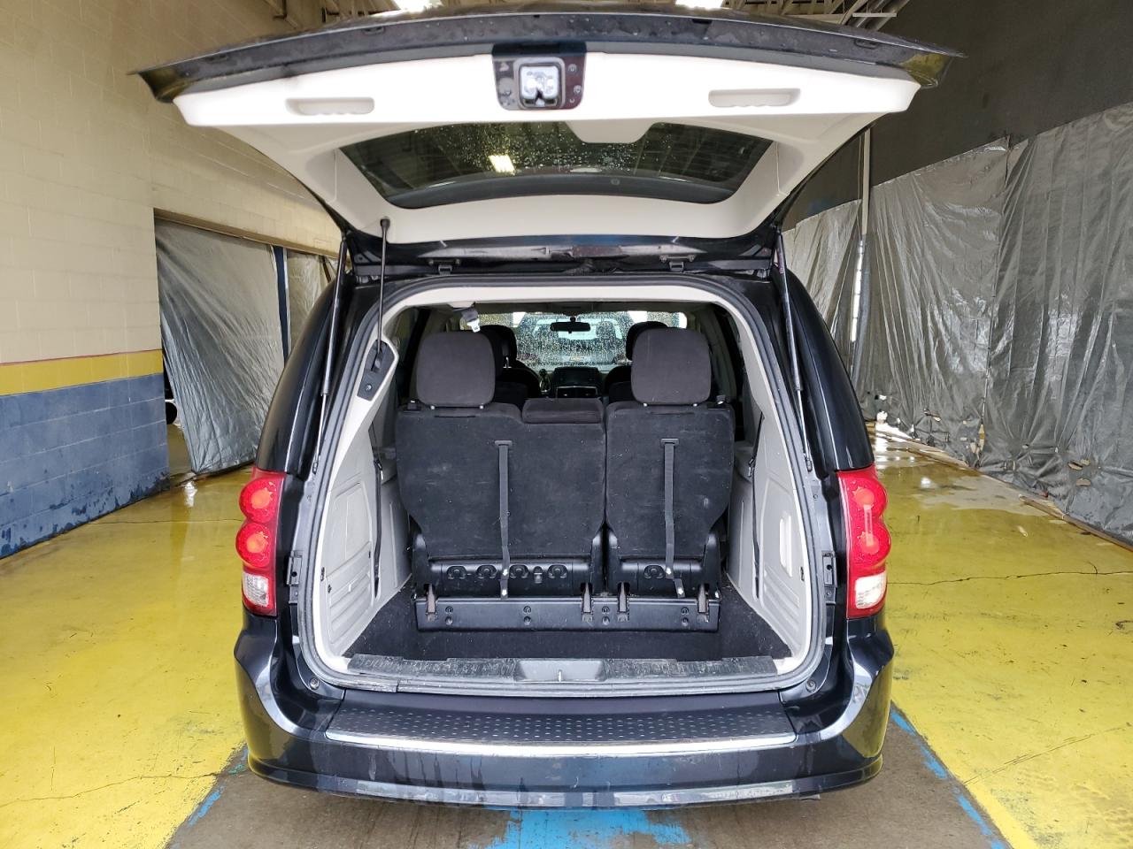 2012 Dodge Grand Caravan Crew Black vin: 2C4RDGDG0CR351402 Damage: Rear Bumper, Heavy Scratch, 1/2 To 1 Inch