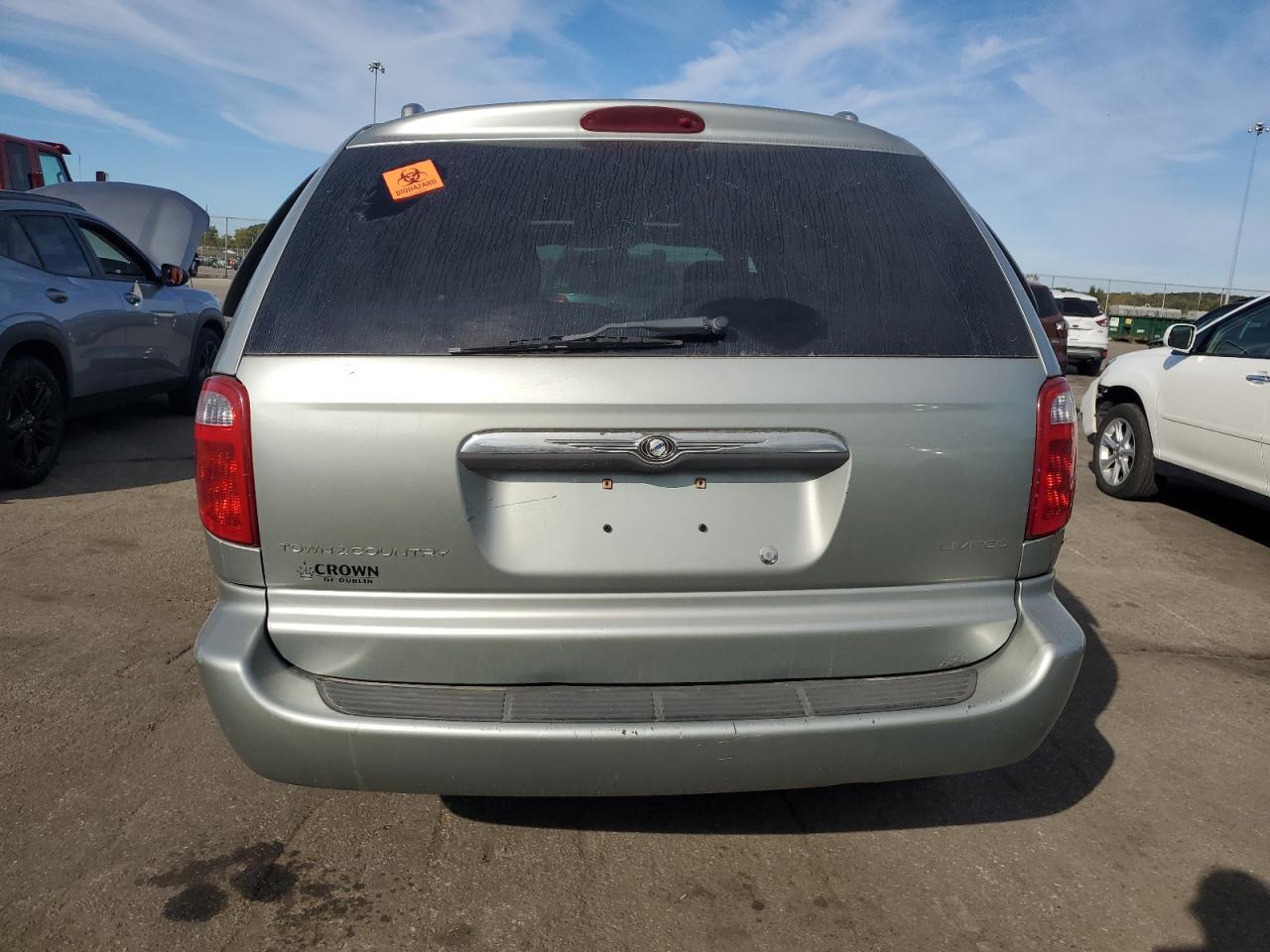 2003 Chrysler Town & Country Limited Серебряный vin: 2C8GP64L23R256618