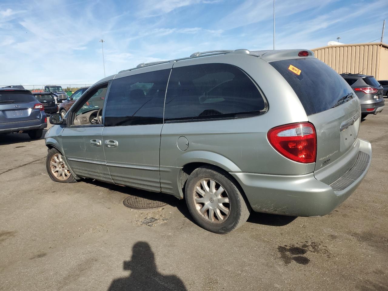 2003 Chrysler Town & Country Limited Серебряный vin: 2C8GP64L23R256618