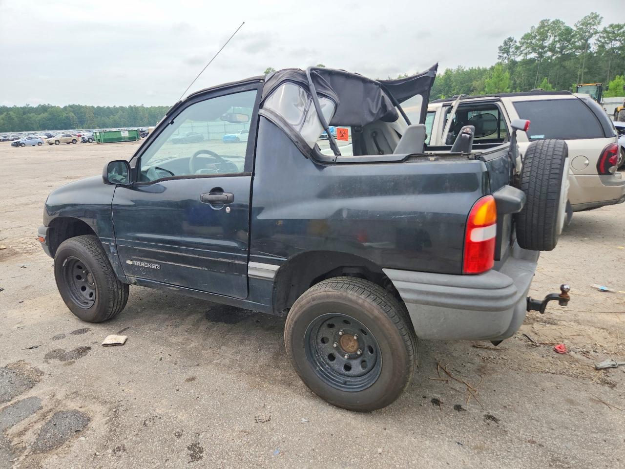 1999 Chevrolet Tracker Black vin: 2CNBE1867X6929902