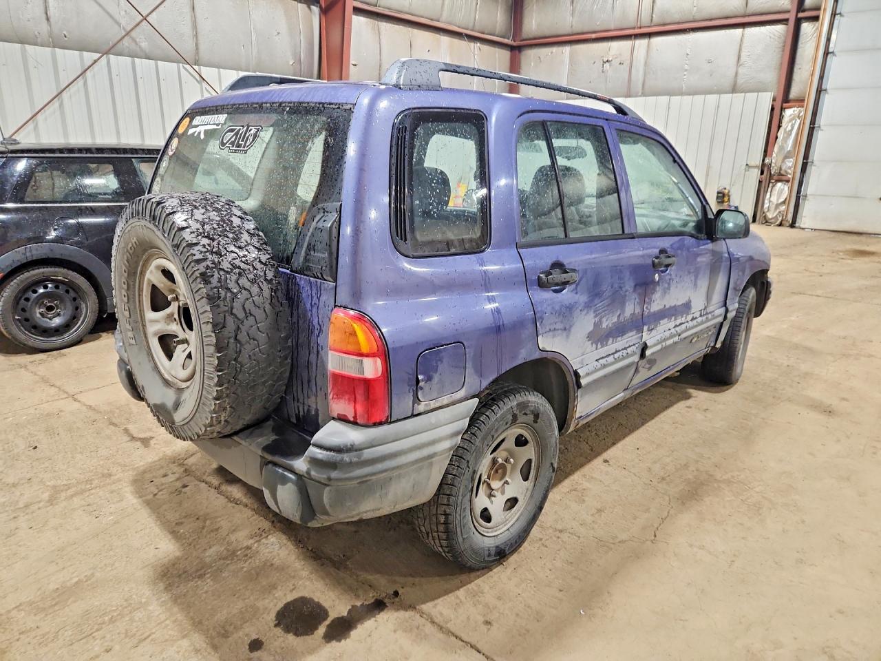 1999 Chevrolet Tracker Blue vin: 2CNBJ13C0X6932410
