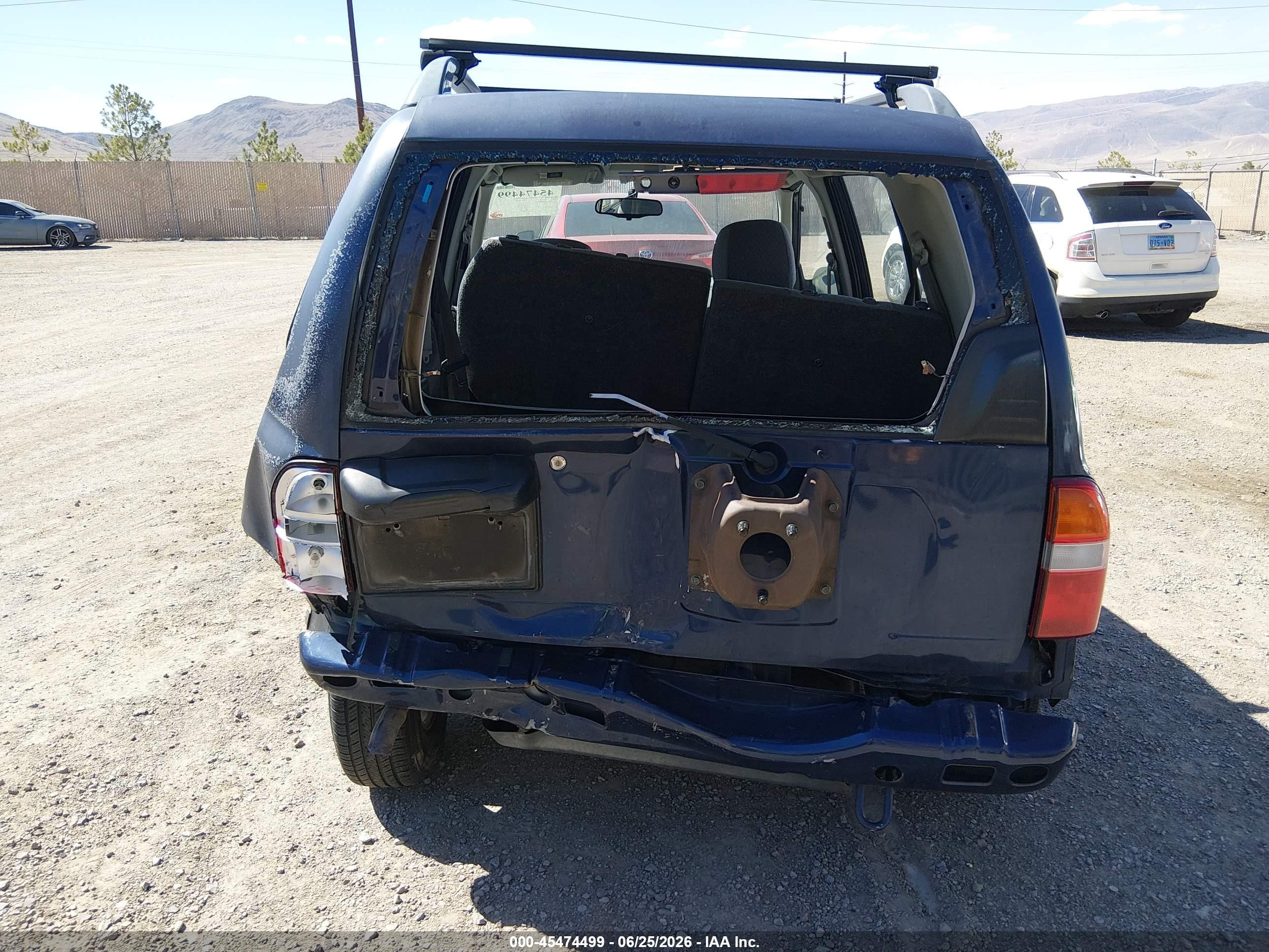 2000 Chevrolet Tracker Hard Top Blue vin: 2CNBJ13C0Y6910666