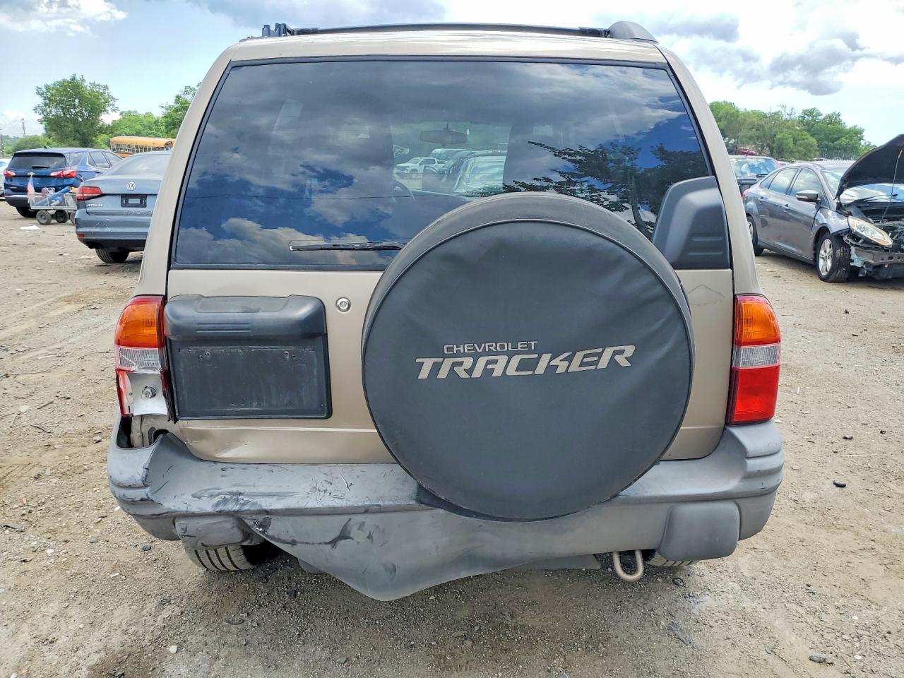 2003 Chevrolet Tracker Желто-коричневый vin: 2CNBJ13C236947081