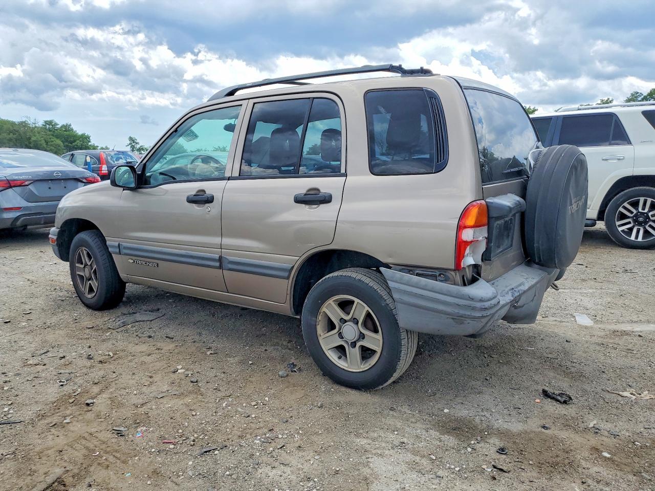 2003 Chevrolet Tracker Желто-коричневый vin: 2CNBJ13C236947081