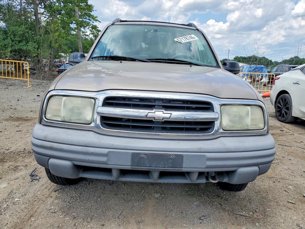 2003 Chevrolet Tracker Желто-коричневый vin: 2CNBJ13C236947081