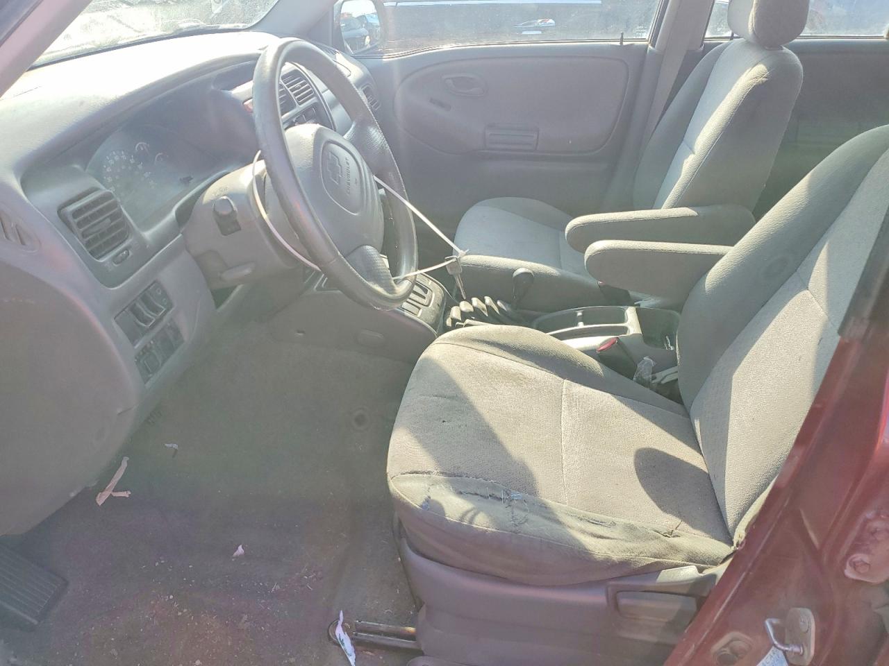 2002 Chevrolet Tracker Темно-бордовый vin: 2CNBJ13C426915571