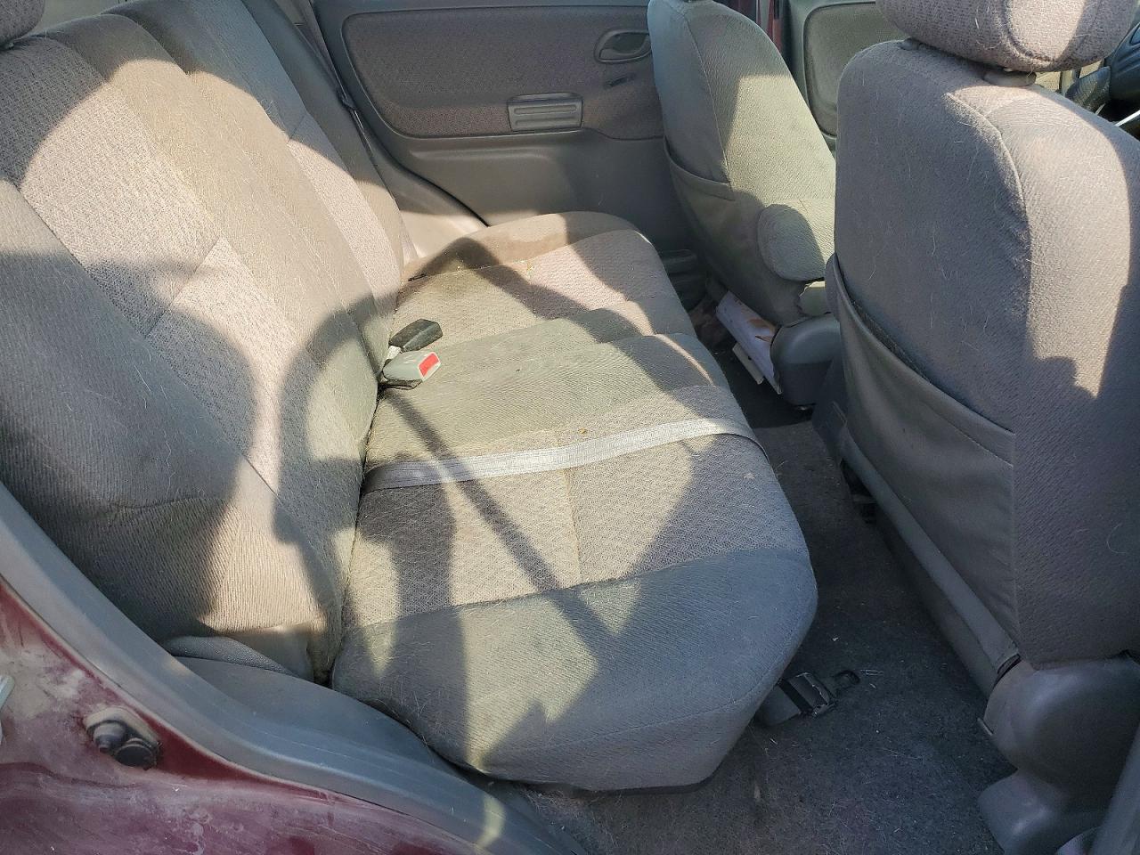 2002 Chevrolet Tracker Темно-бордовый vin: 2CNBJ13C426915571