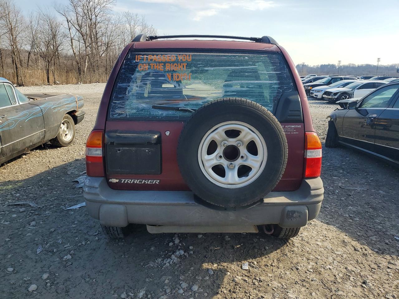 2002 Chevrolet Tracker Темно-бордовый vin: 2CNBJ13C426915571