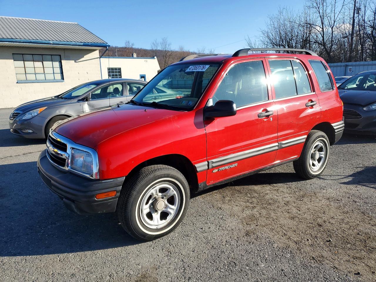 2003 Chevrolet Tracker Red vin: 2CNBJ13CX36952142