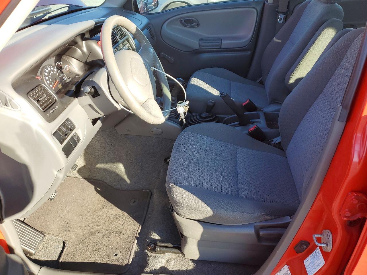 2003 Chevrolet Tracker Red vin: 2CNBJ13CX36952142