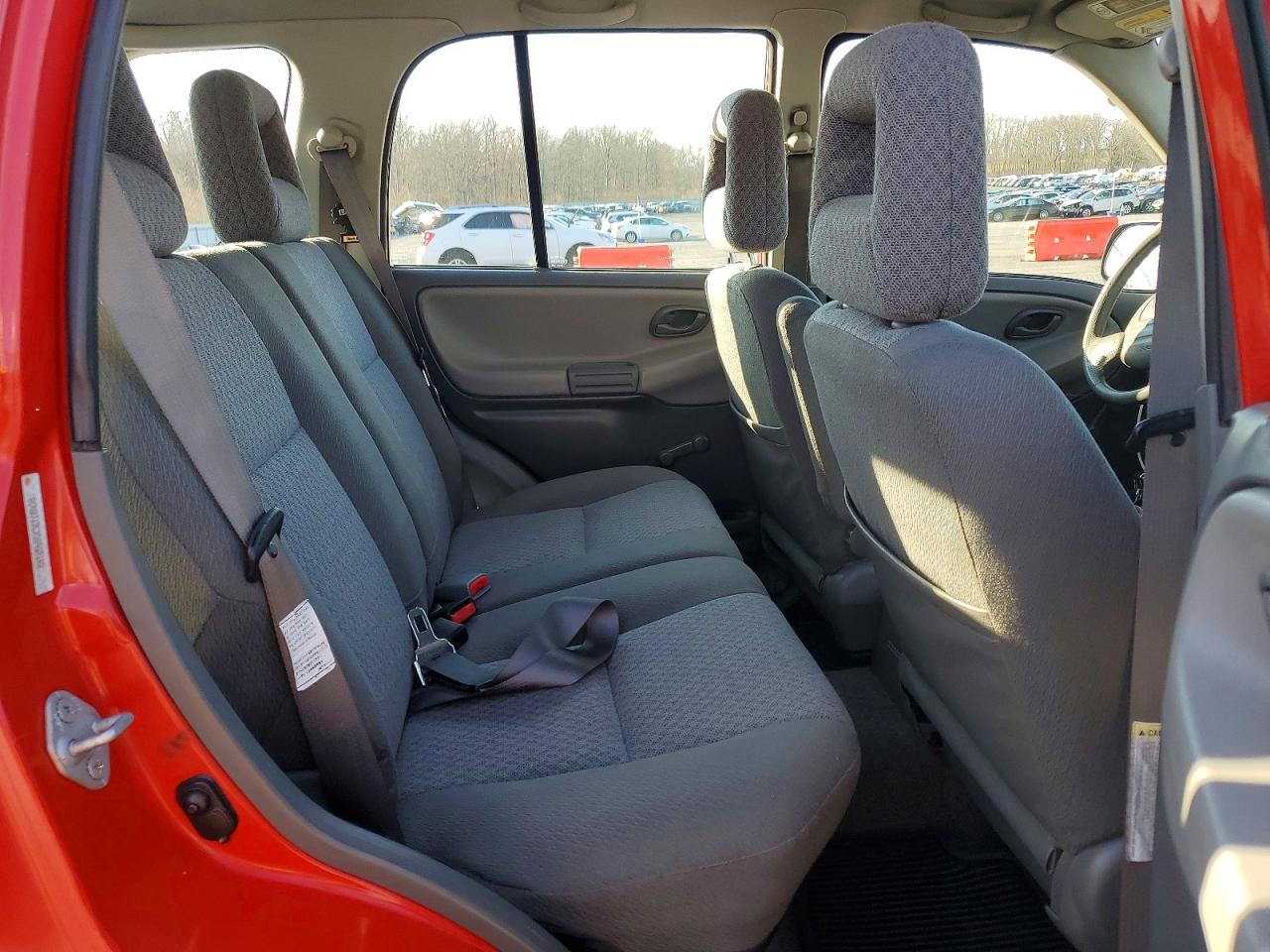 2003 Chevrolet Tracker Red vin: 2CNBJ13CX36952142