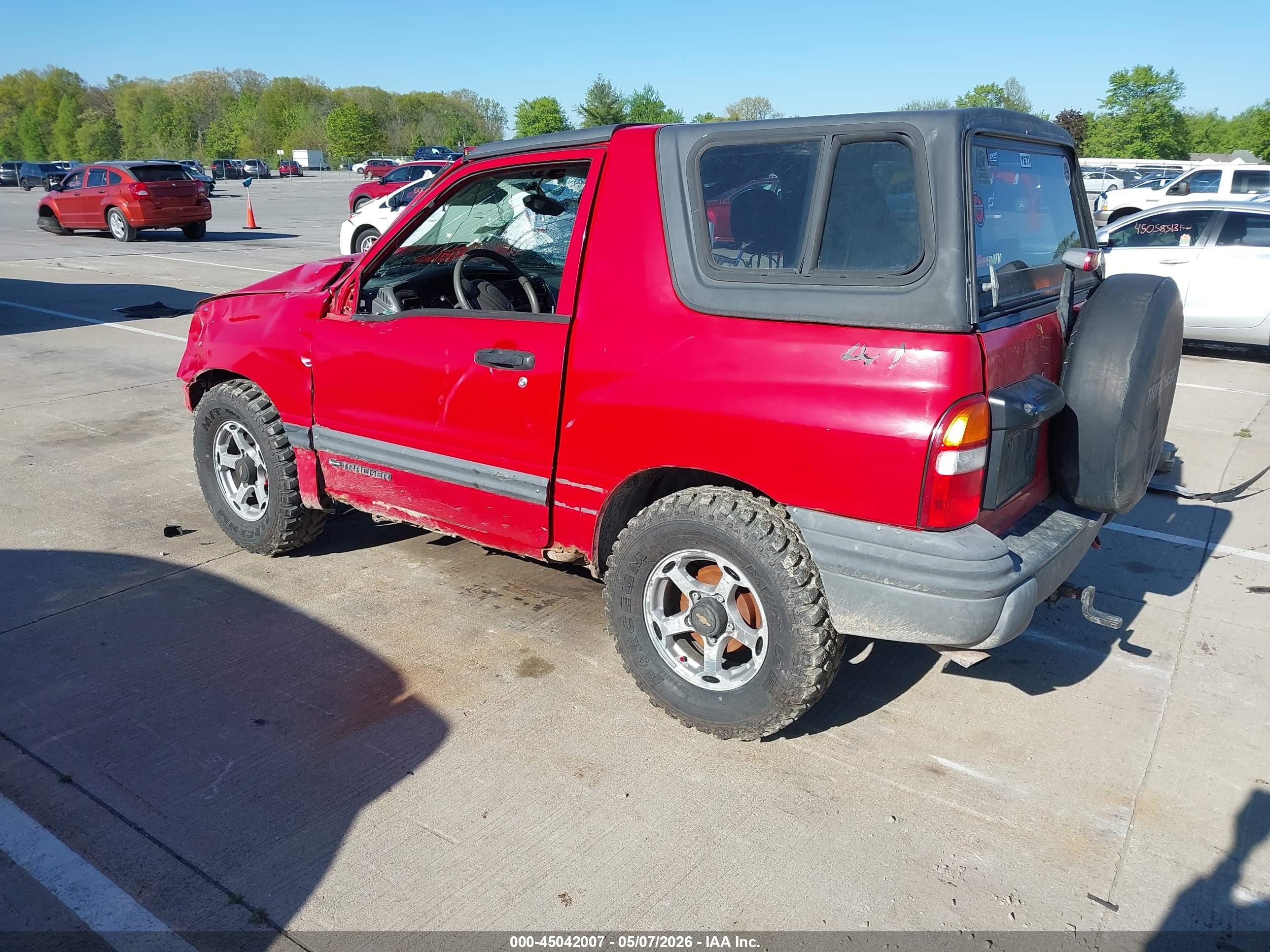 1999 Chevrolet Tracker   Red vin: 2CNBJ18C9X6931507