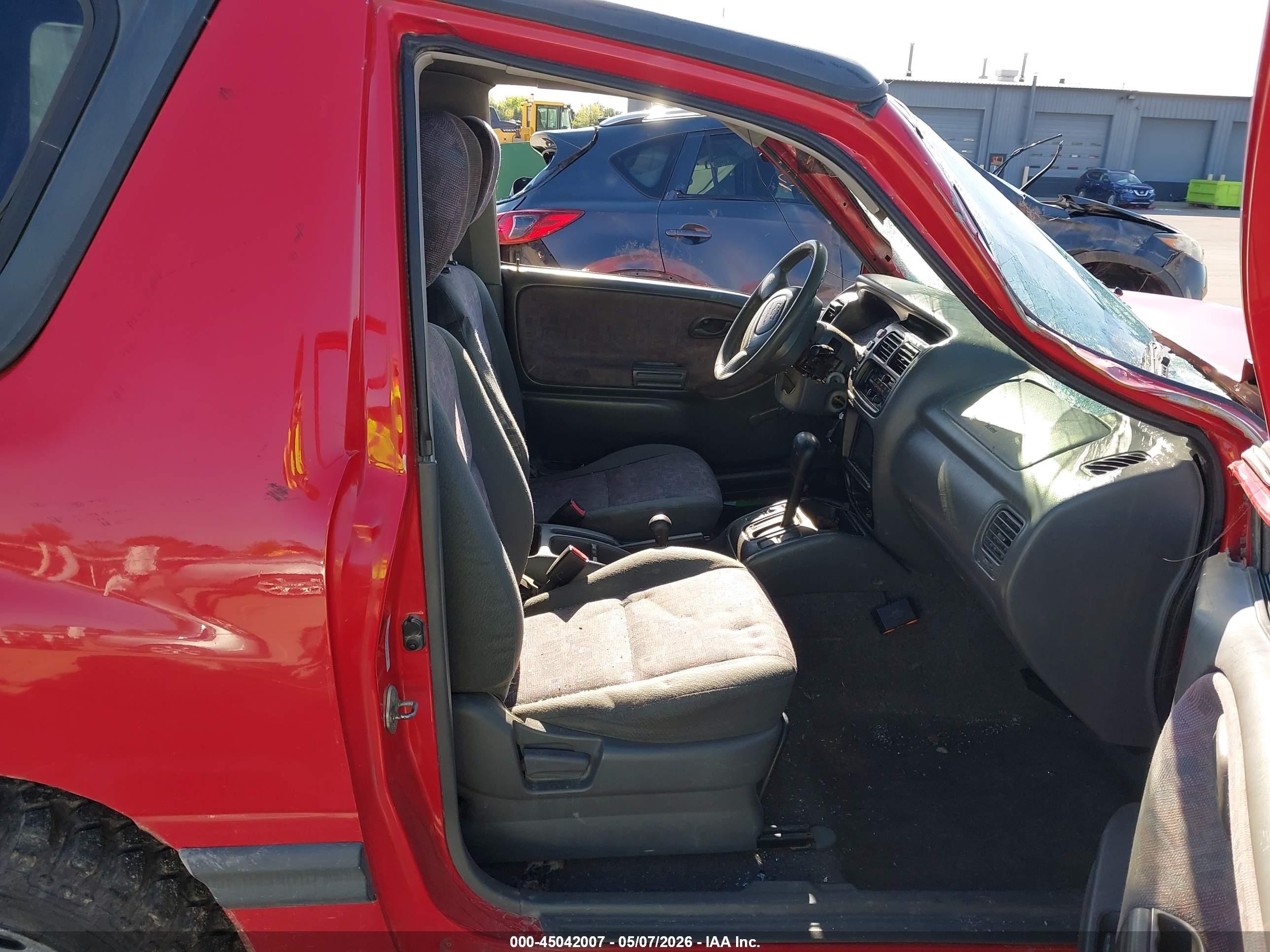 1999 Chevrolet Tracker   Red vin: 2CNBJ18C9X6931507