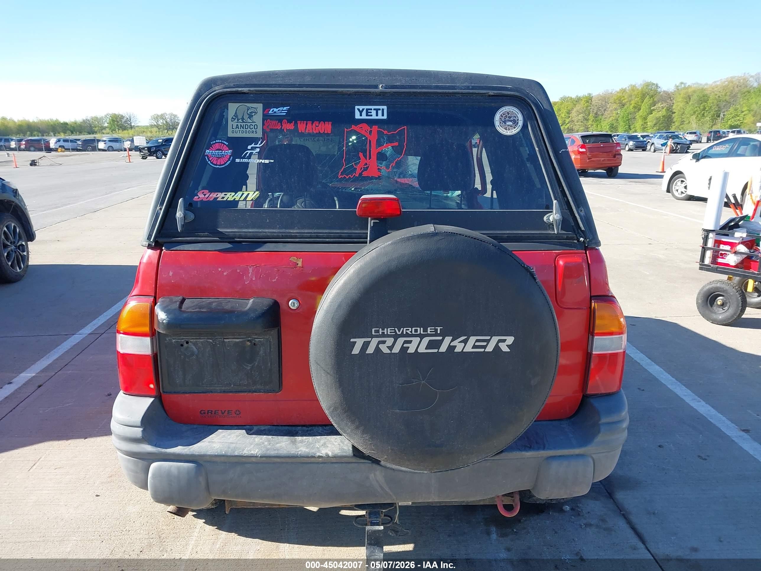 1999 Chevrolet Tracker   Red vin: 2CNBJ18C9X6931507