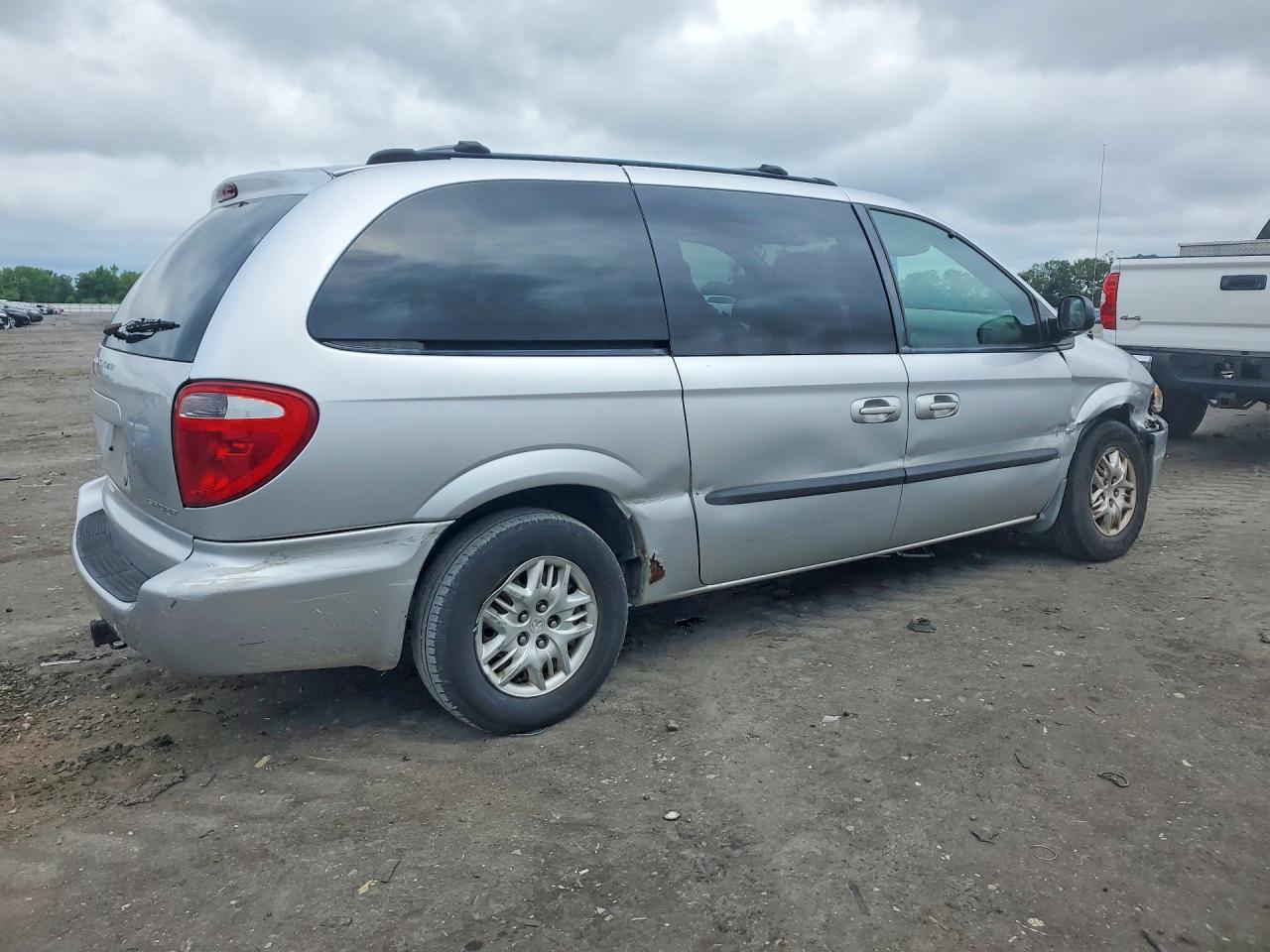 2003 Dodge Grand Caravan Sport Серебряный vin: 2D4GP44353R110819