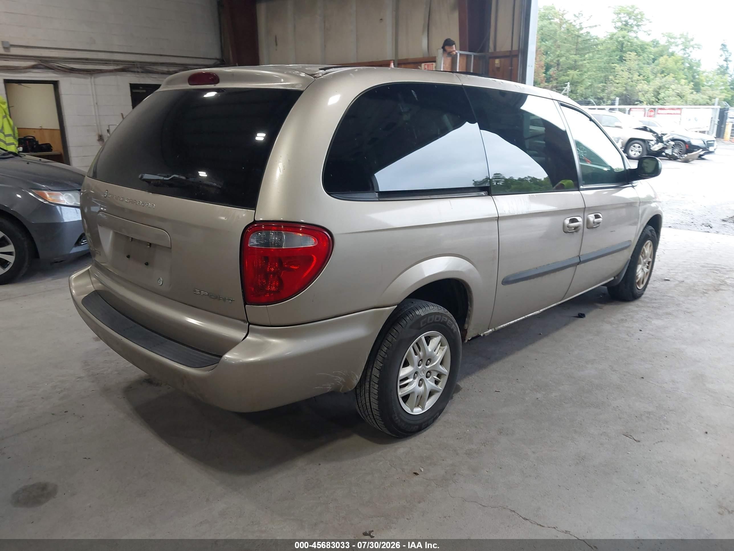 2003 Dodge Grand Caravan Sport Gold vin: 2D4GP44393R220384