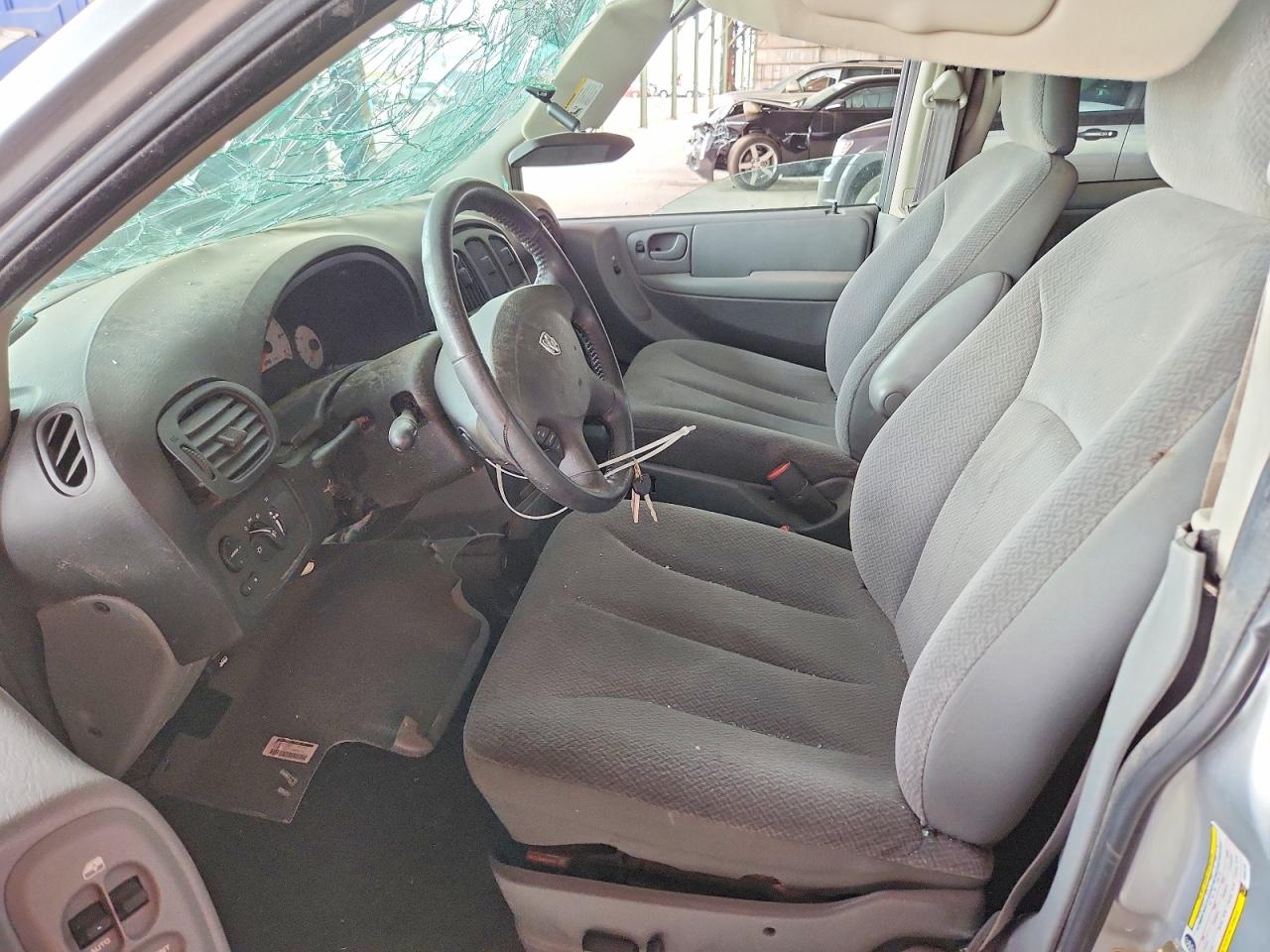 2005 Dodge Grand Caravan Sxt Silver vin: 2D4GP44LX5R392796